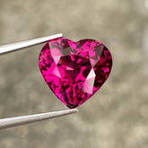 6-28-carats-vivid-reddish-pink-garnet-heart-faceted-cut-natural-nigerian-gemstone