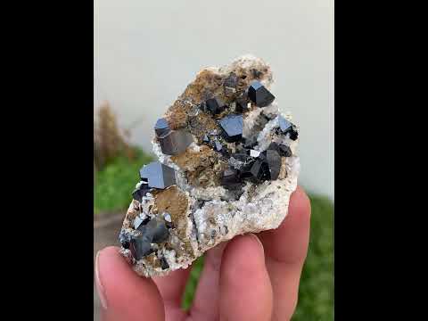 Metallic Anatase Crystals Group on Albite