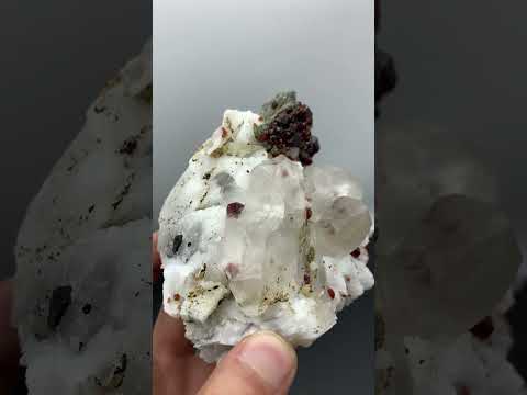 Red Spessertine Garnet on Albite