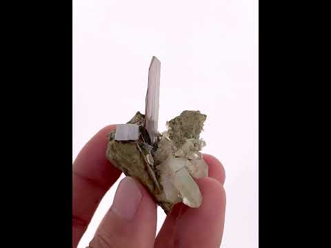Brookite Crystal on Quartz Cluster