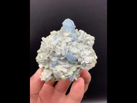 Rare Vorobyevite Crystals on Muscovite