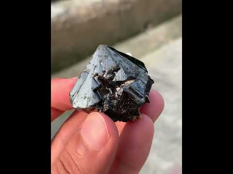 Black Cassiterite crystals with Albite