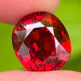 Iridescent Red Spessartite Garnet 6.15 carats Fancy Oval Cut Tanzanian Gemstone