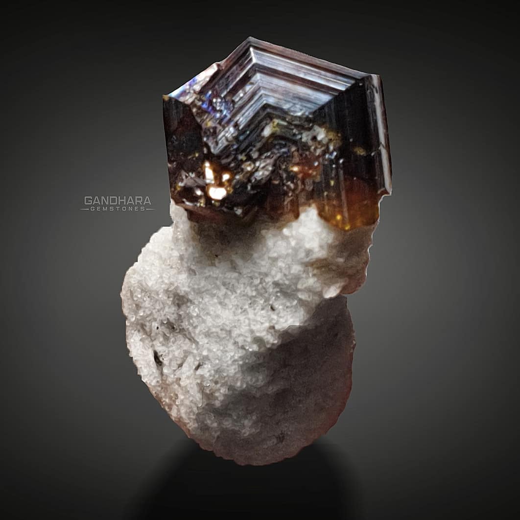 Bastnasite Crystal on White Albite