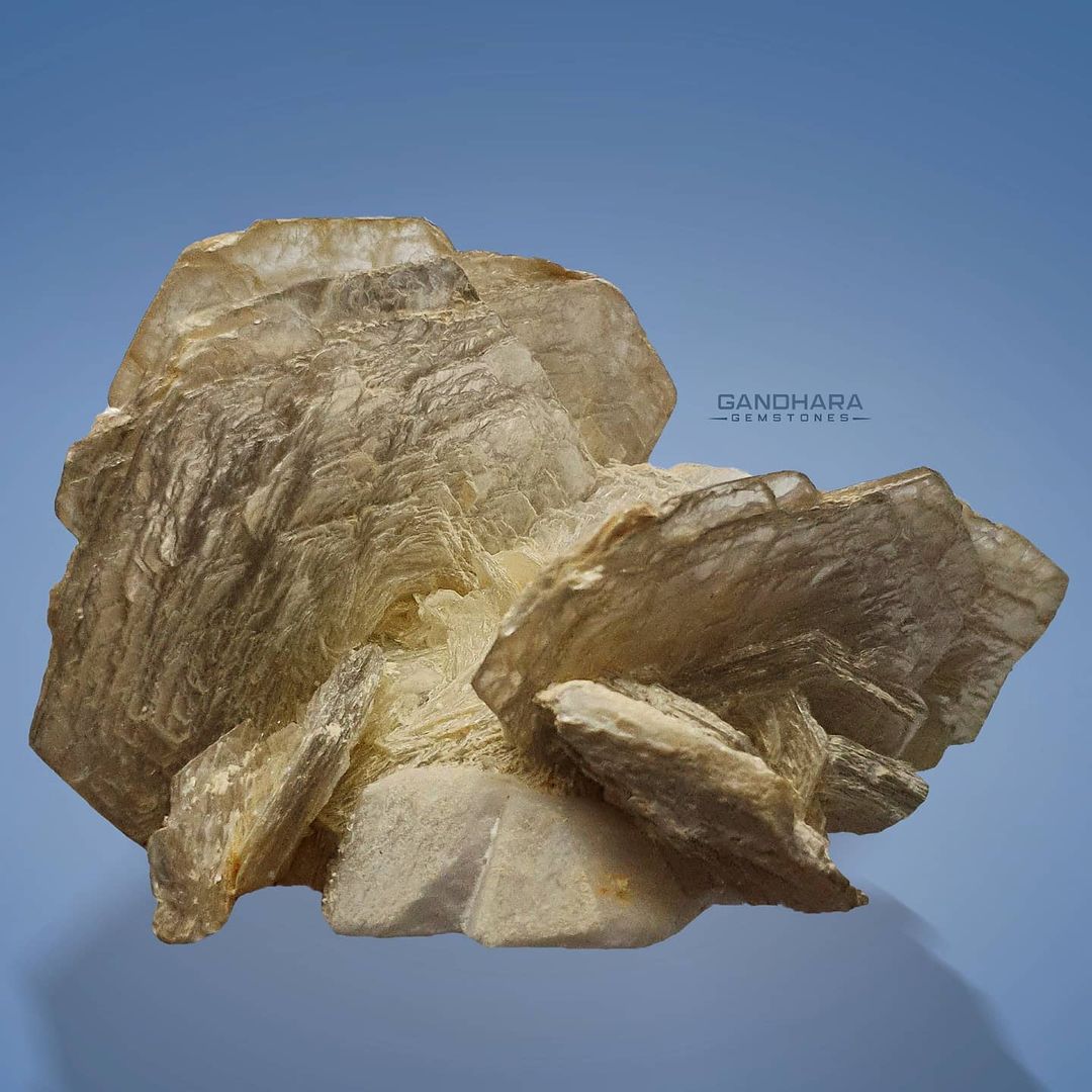 Muscovite Crystals on Albite with Microlite