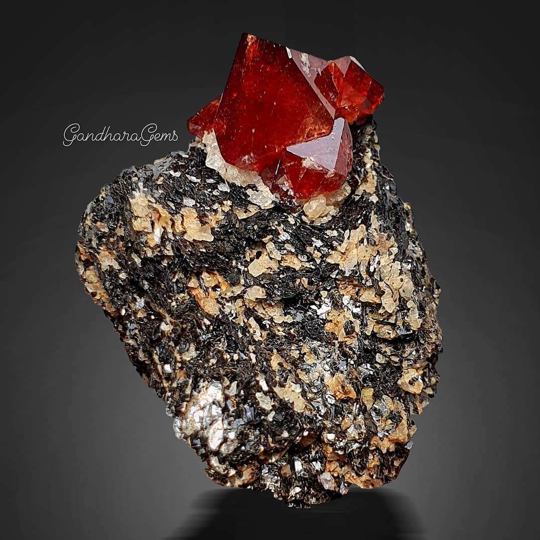 Ruby Red Zircon Crystal on Graphite Matrix