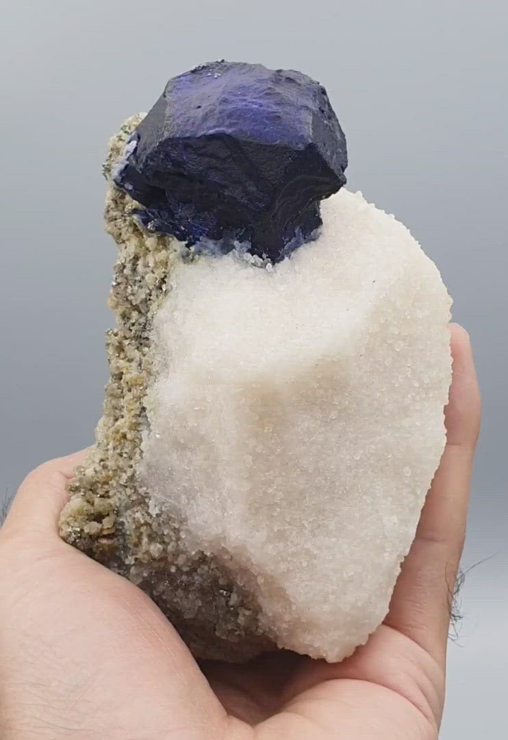 Vibrant Blue Isomatric and Isolated Lazurite Ball on Calcite with Pyrite