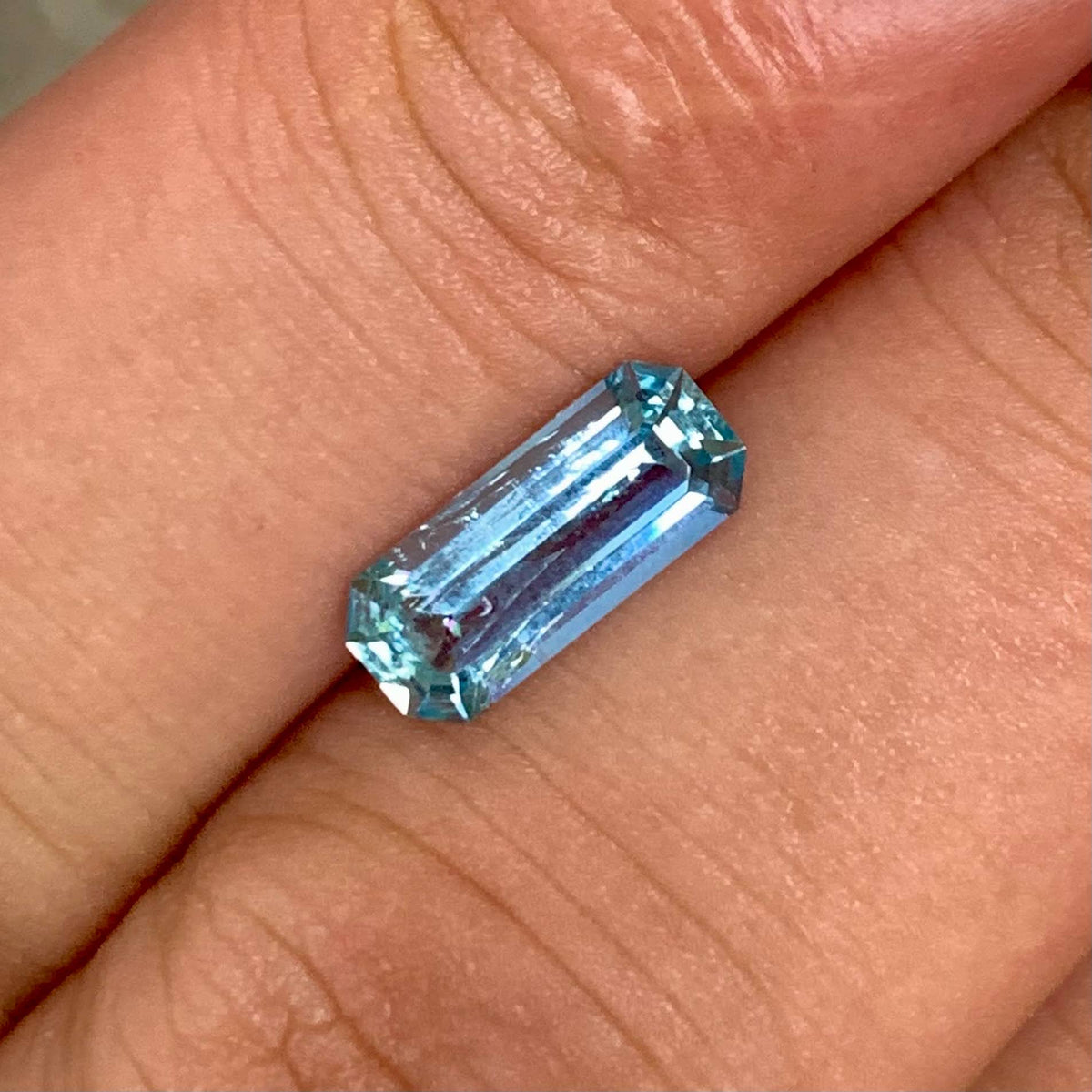 deep-ocean-blue-nigerian-aquamarine-1-47ct-si-octagon-emerald-cut