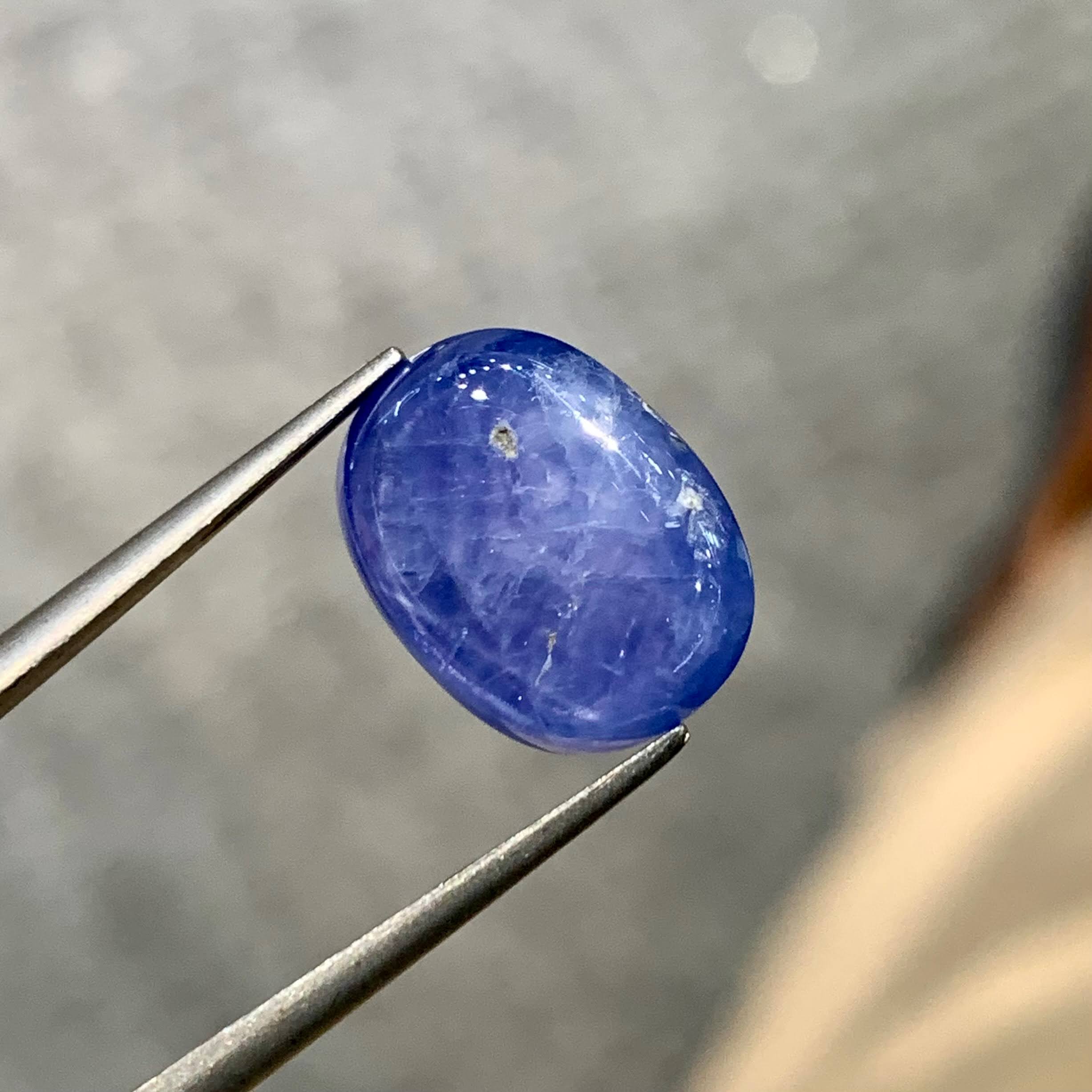 12-34-carats-vivid-blue-star-sapphire-oval-cabochon-burma