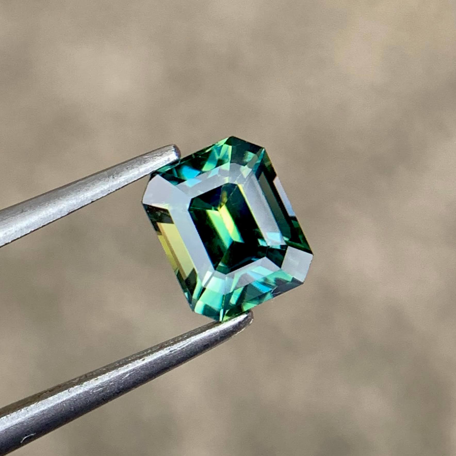 1-16ct-natural-bicolor-sapphire-madagascar-emerald-cut