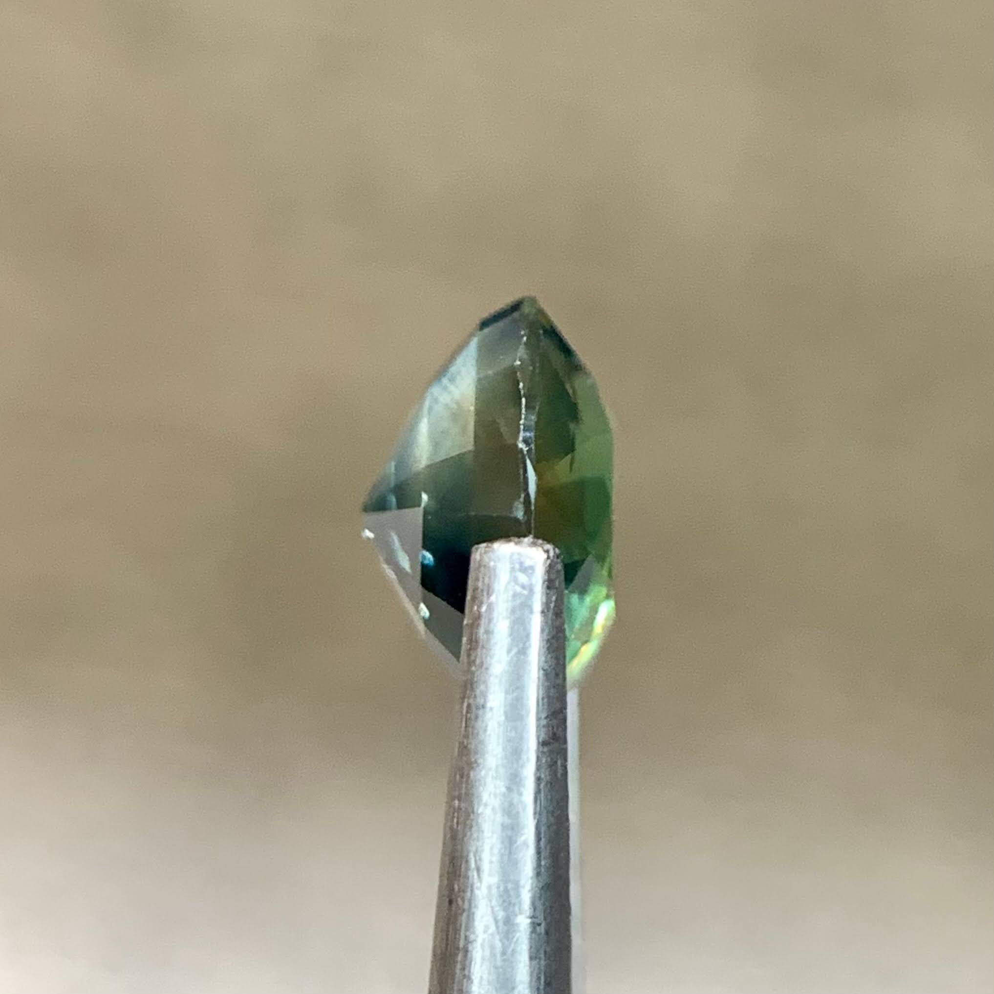 teal-sapphire-1-29ct-madagascar-round