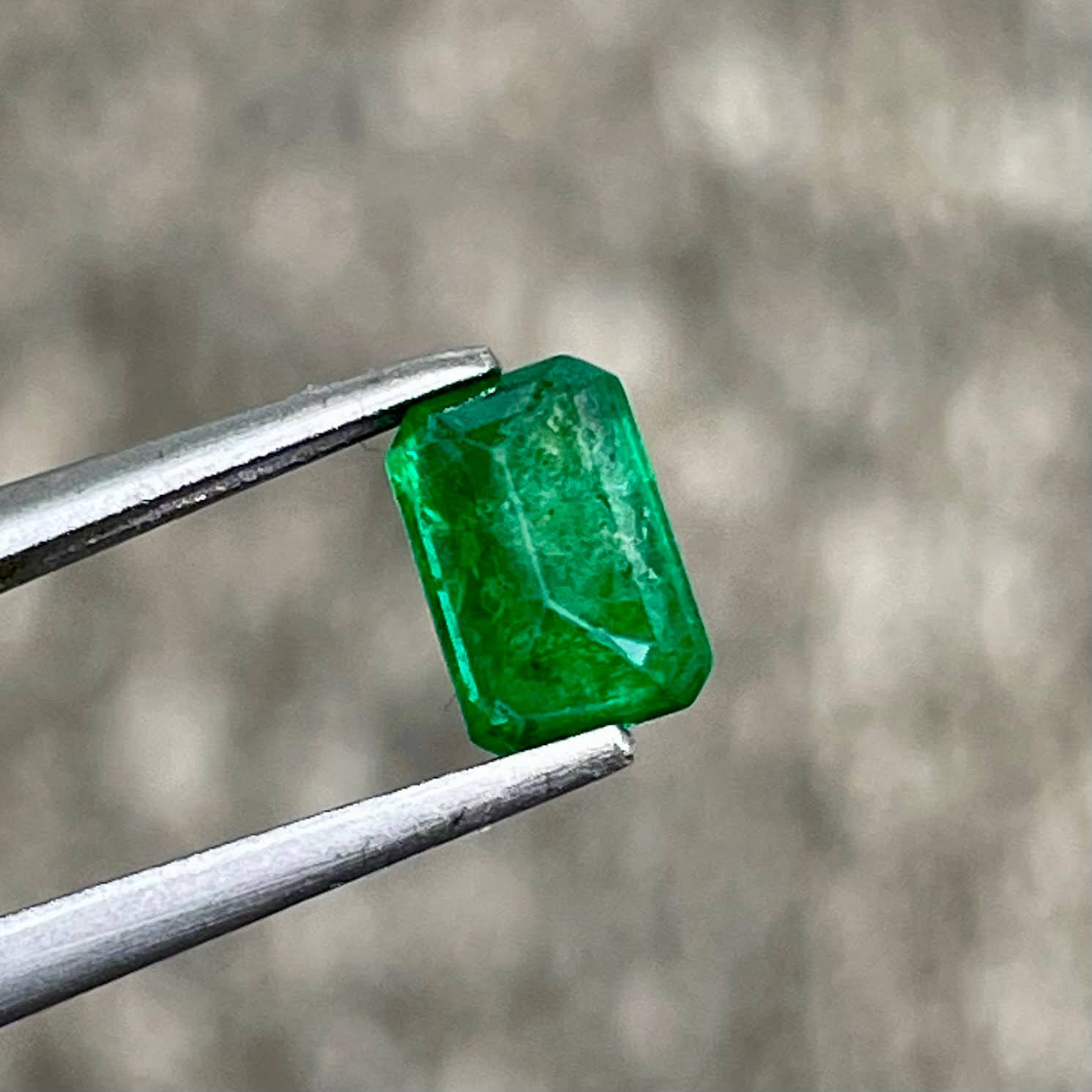 0.68ct Vivid Green Zambian Emerald Cut Emerald