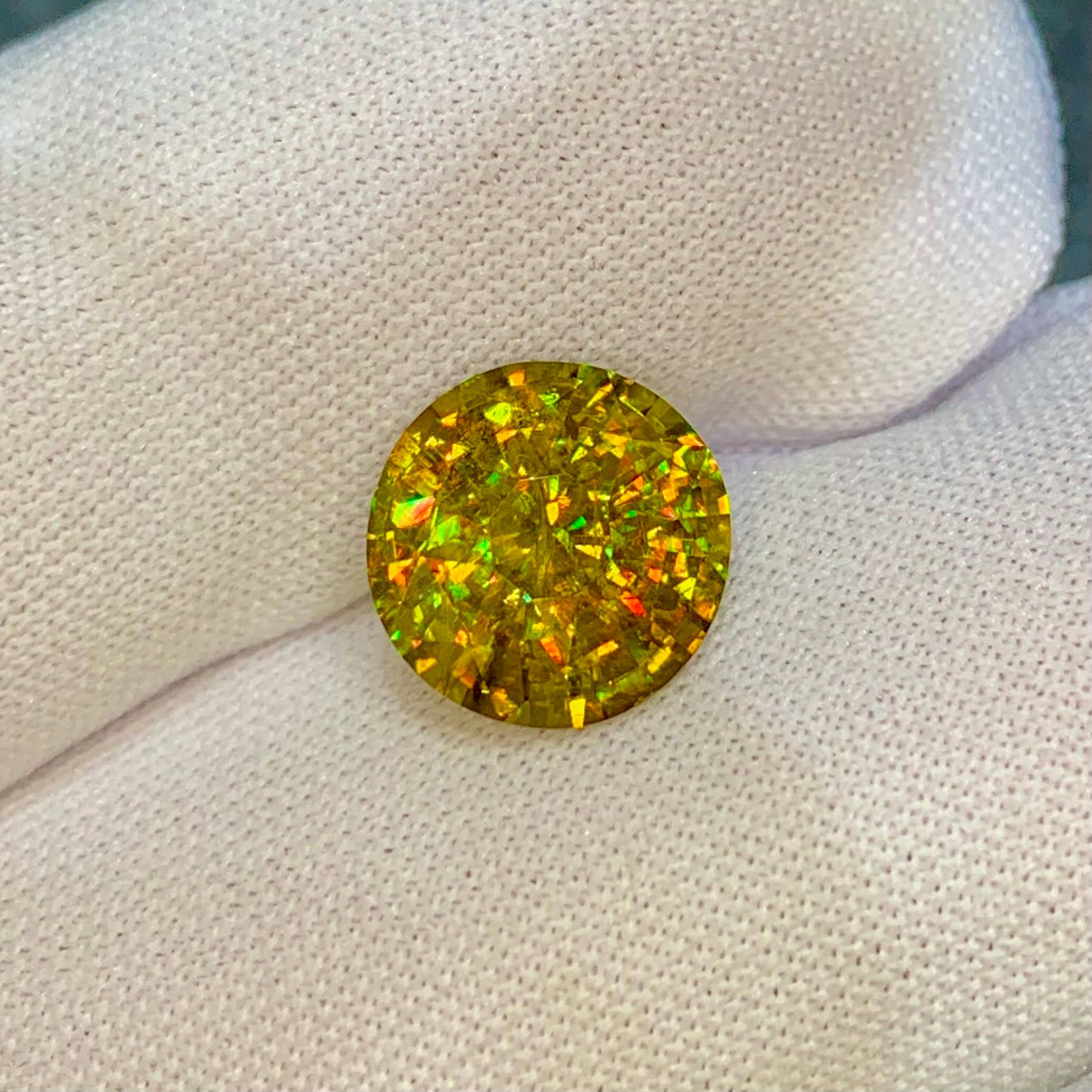 5.37ct Fancy Rainbow Sphene Round Cut