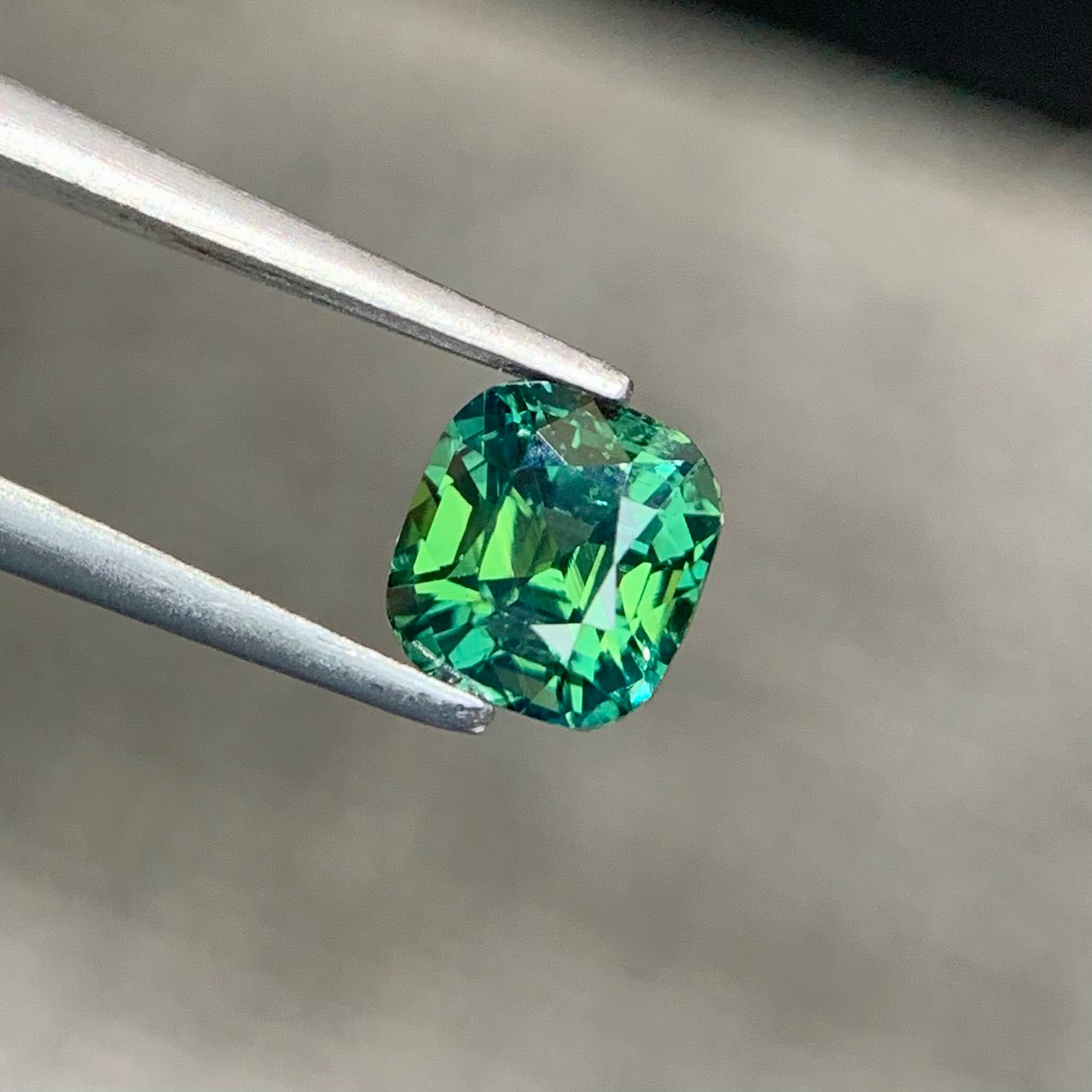 1.47ct Neon Teal Sapphire Cushion Cut 