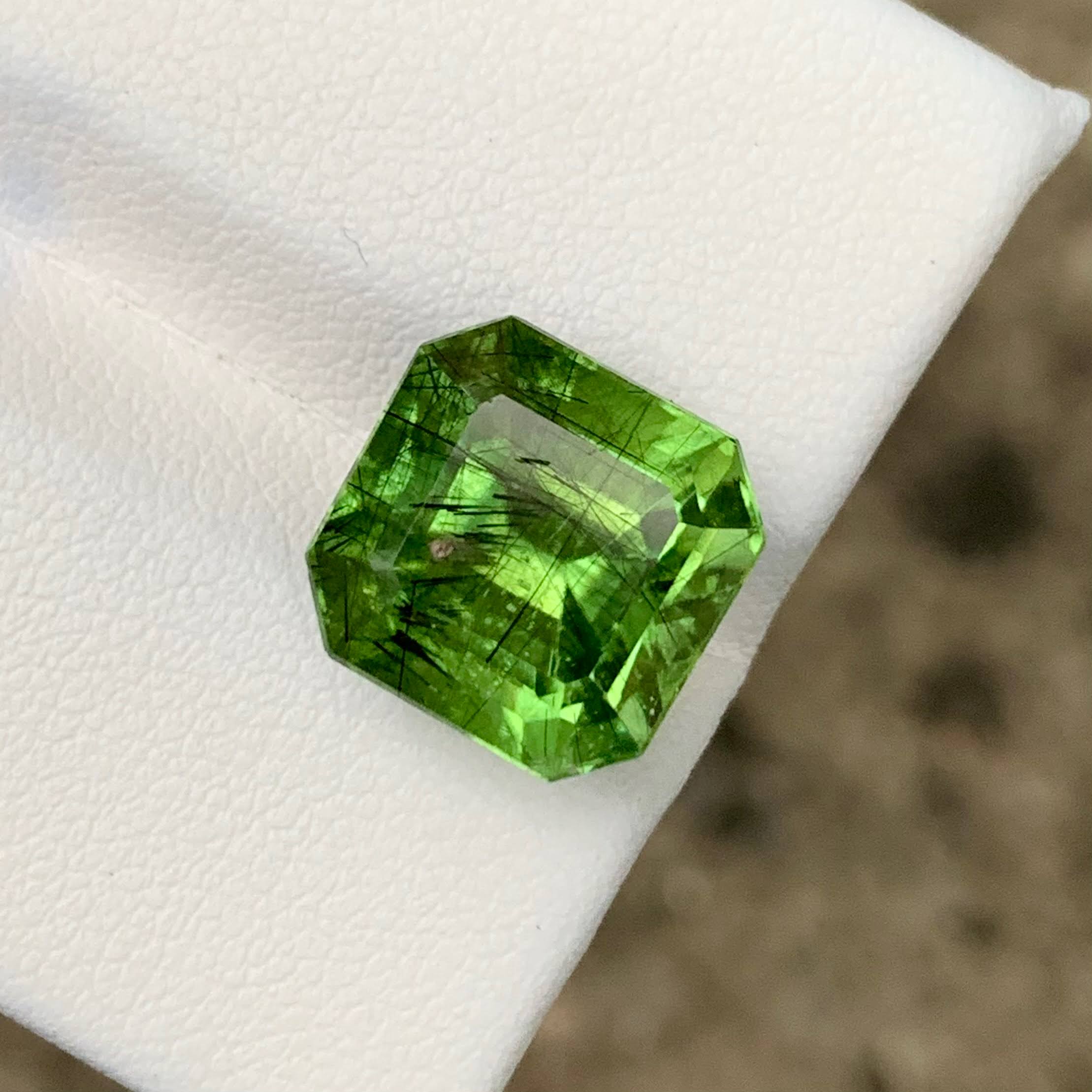 11.07ct Ludwigite Include Peridot Emerald Cut