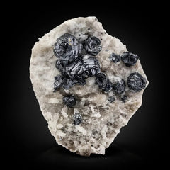 Metallic Hematite Crystals on Albite