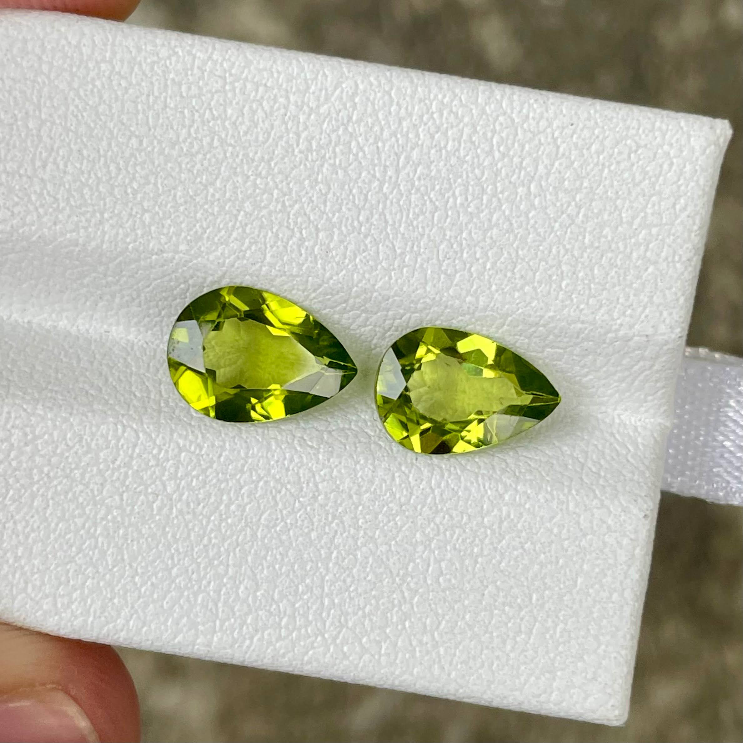 3.60 Carats Pear Shape Peridot Pair