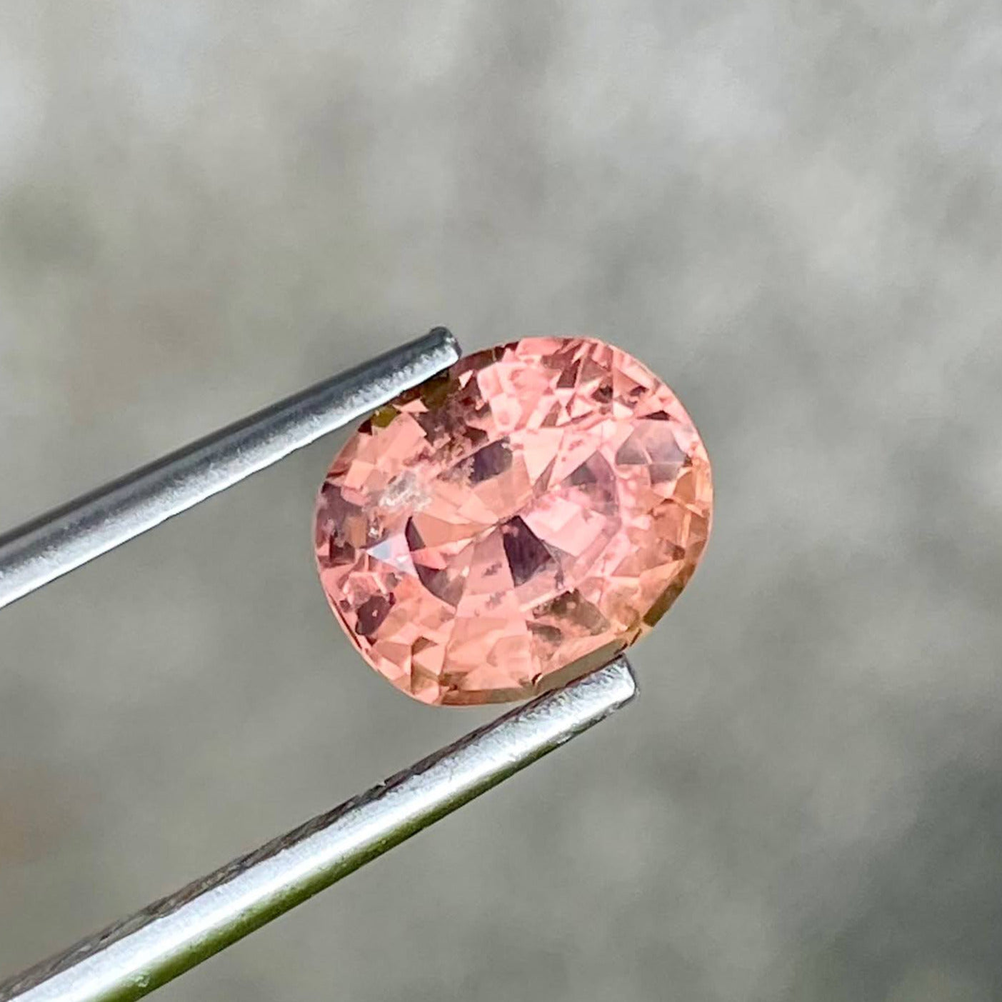 1.98 carats Peach Sapphire Oval Stone