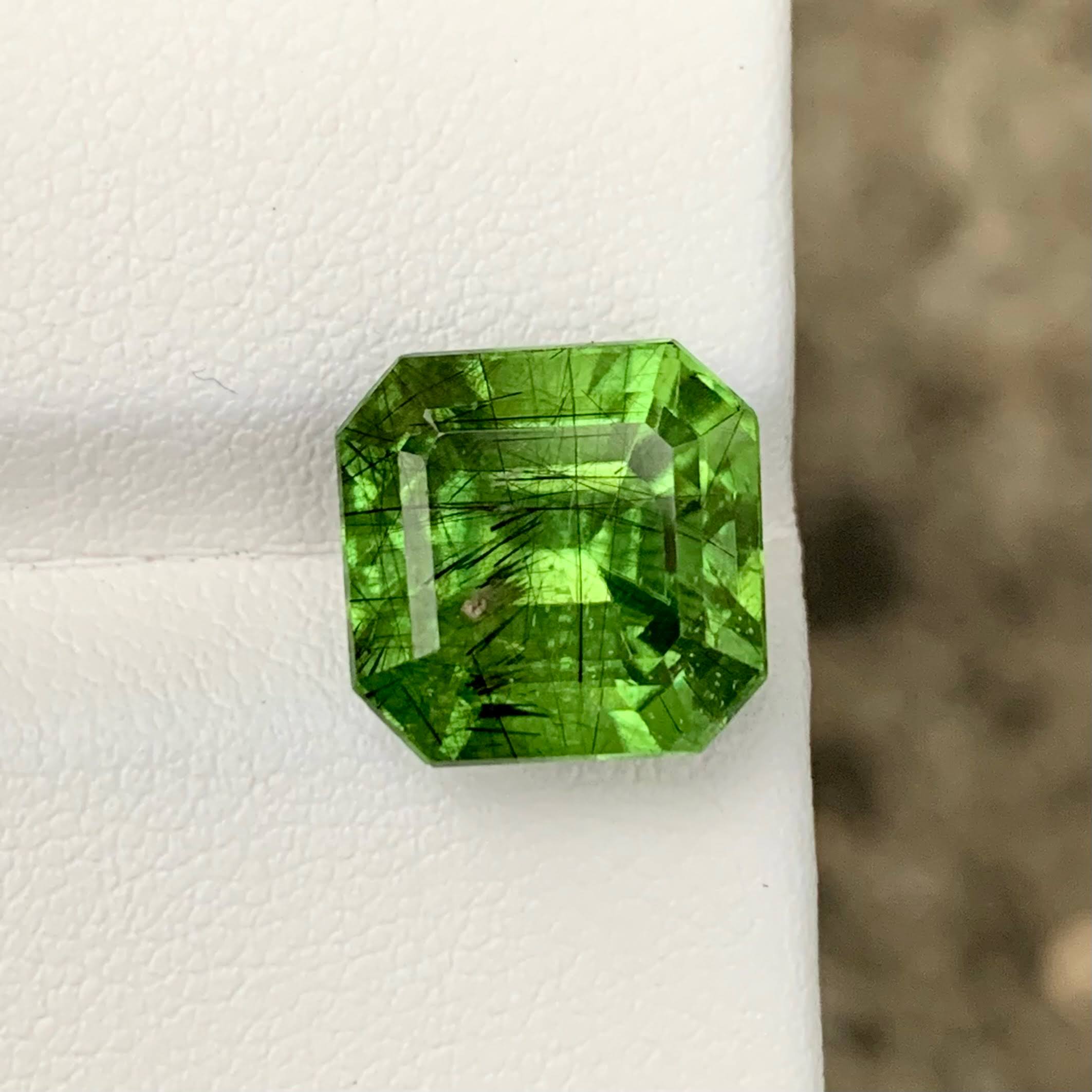 11.07ct Ludwigite Include Peridot Emerald Cut