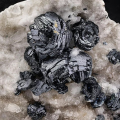 Metallic Hematite Crystals on Albite