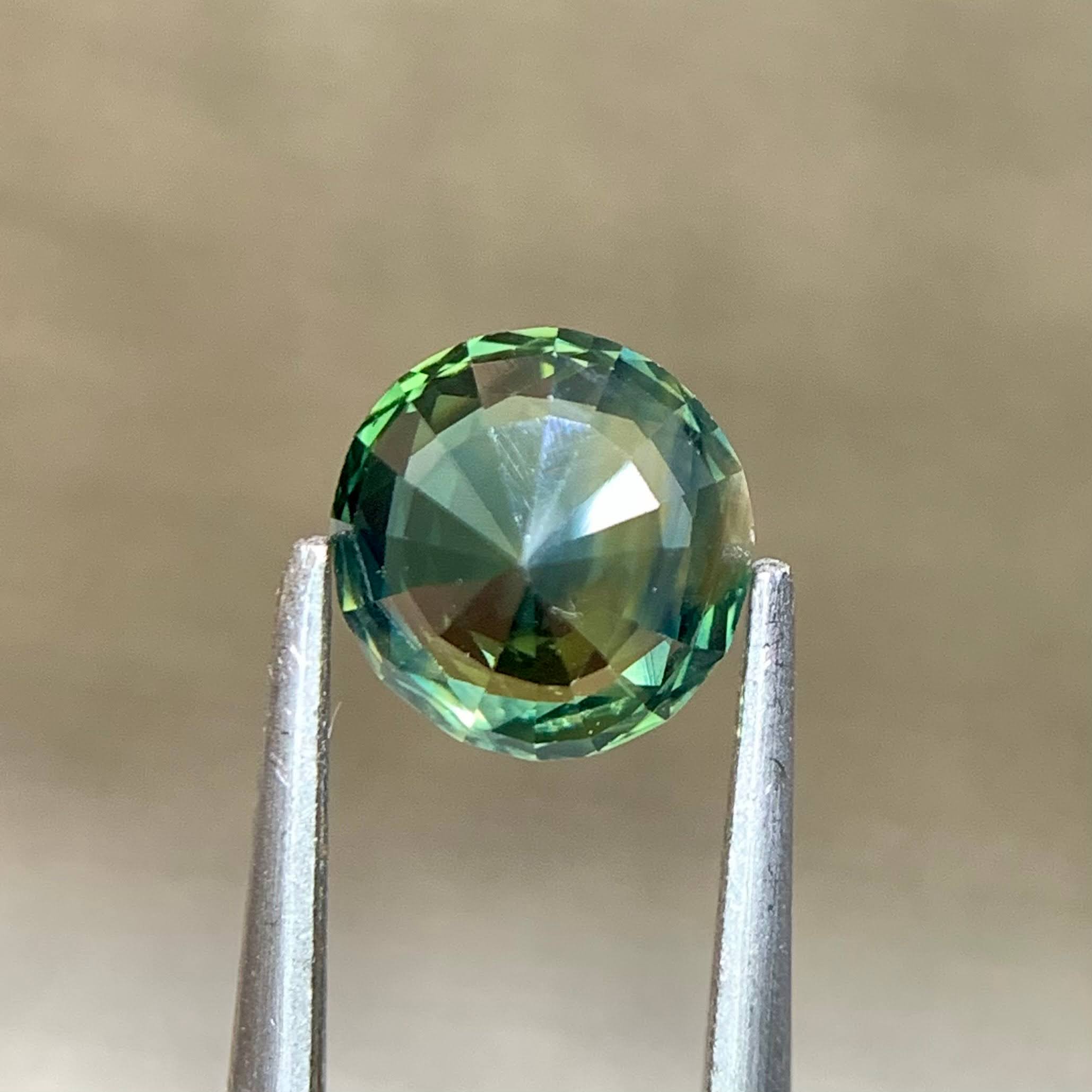 teal-sapphire-1-29ct-madagascar-round