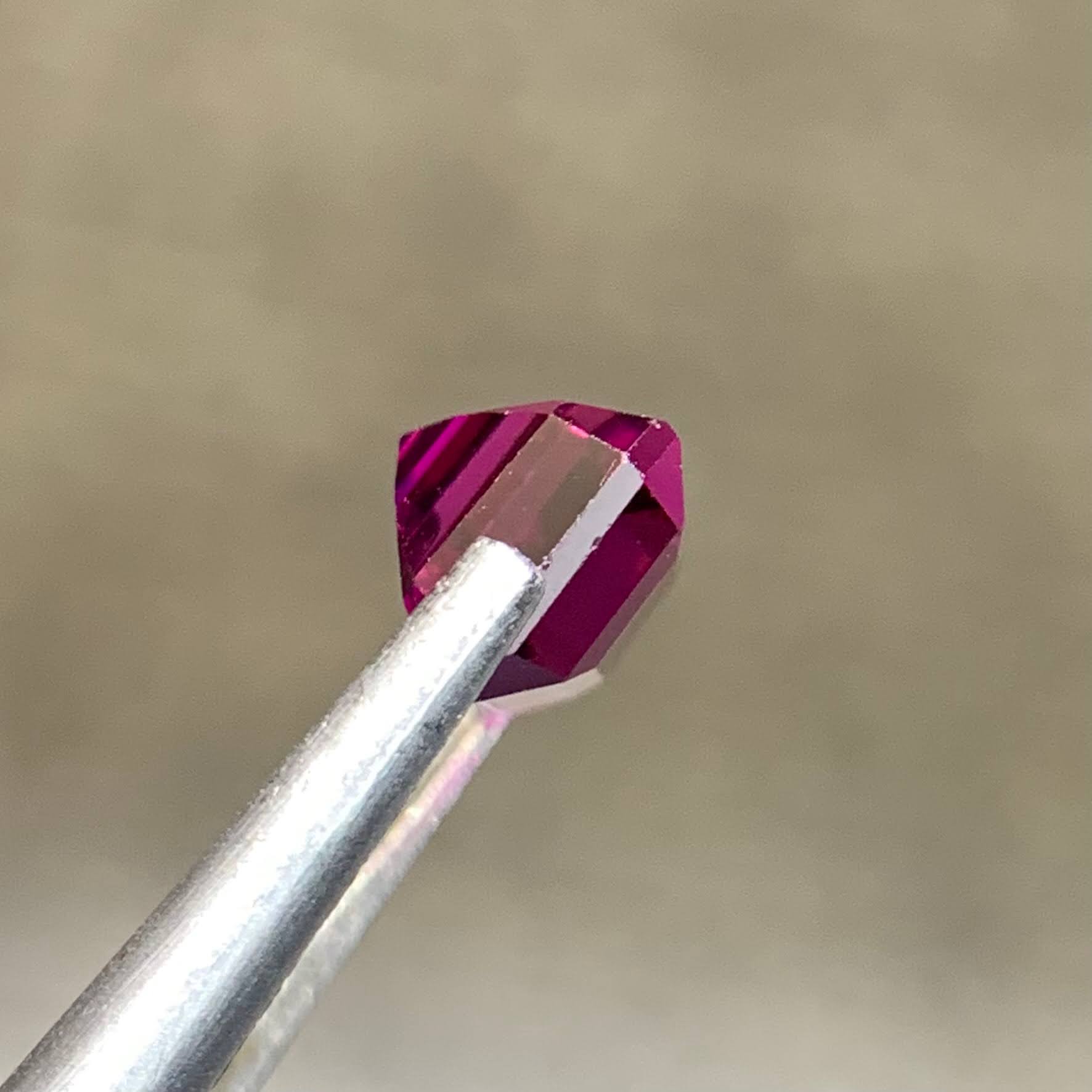 pinkish-purple-tanga-mine-garnet-1-64ct-tanzania-vvs-octagon-emerald