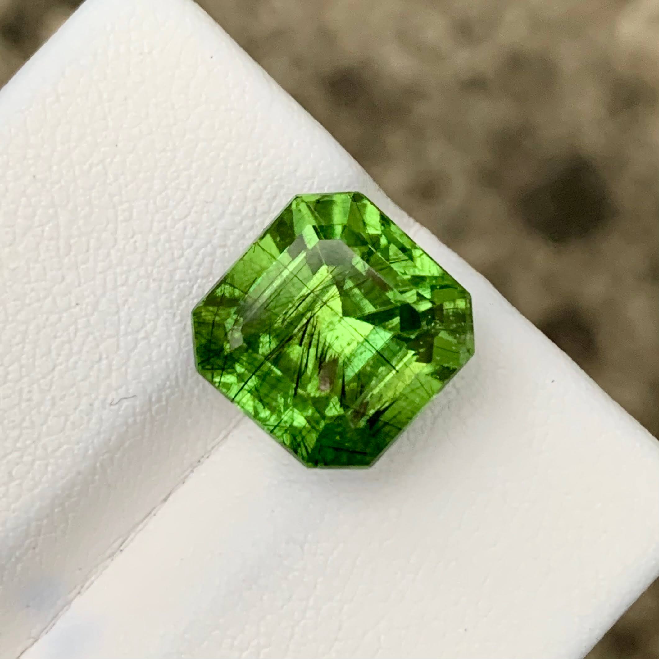 11.07ct Ludwigite Include Peridot Emerald Cut