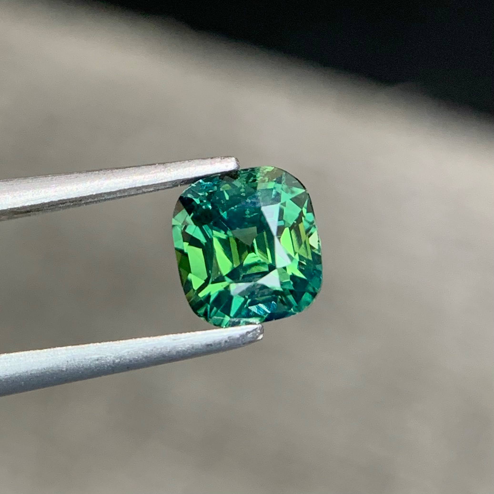 1.47ct Neon Teal Sapphire Cushion Cut 