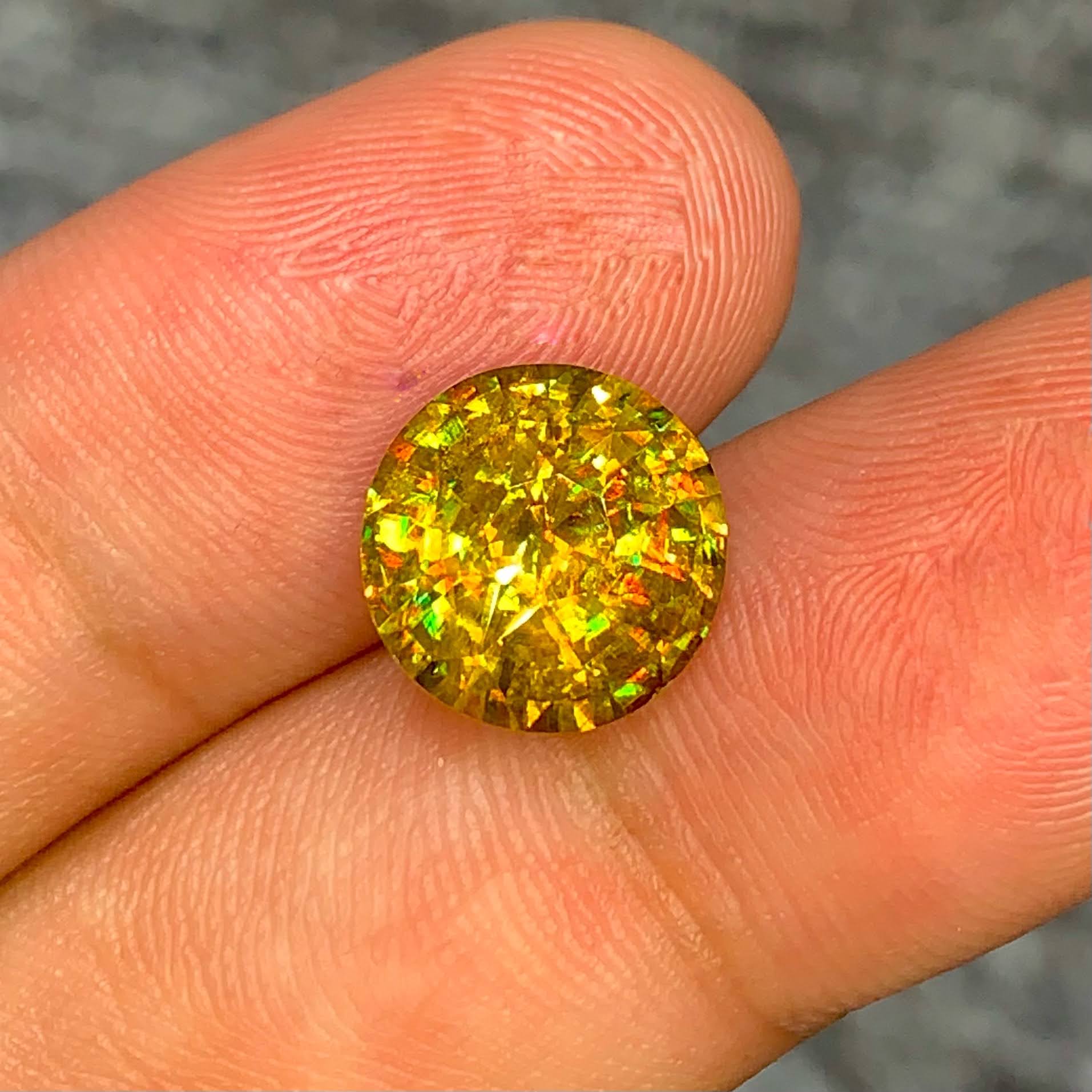 5.37ct Fancy Rainbow Sphene Round Cut