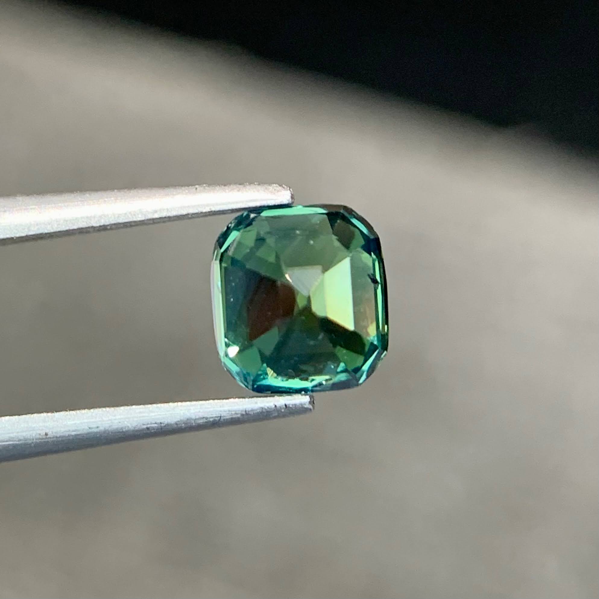 1.47ct Neon Teal Sapphire Cushion Cut 