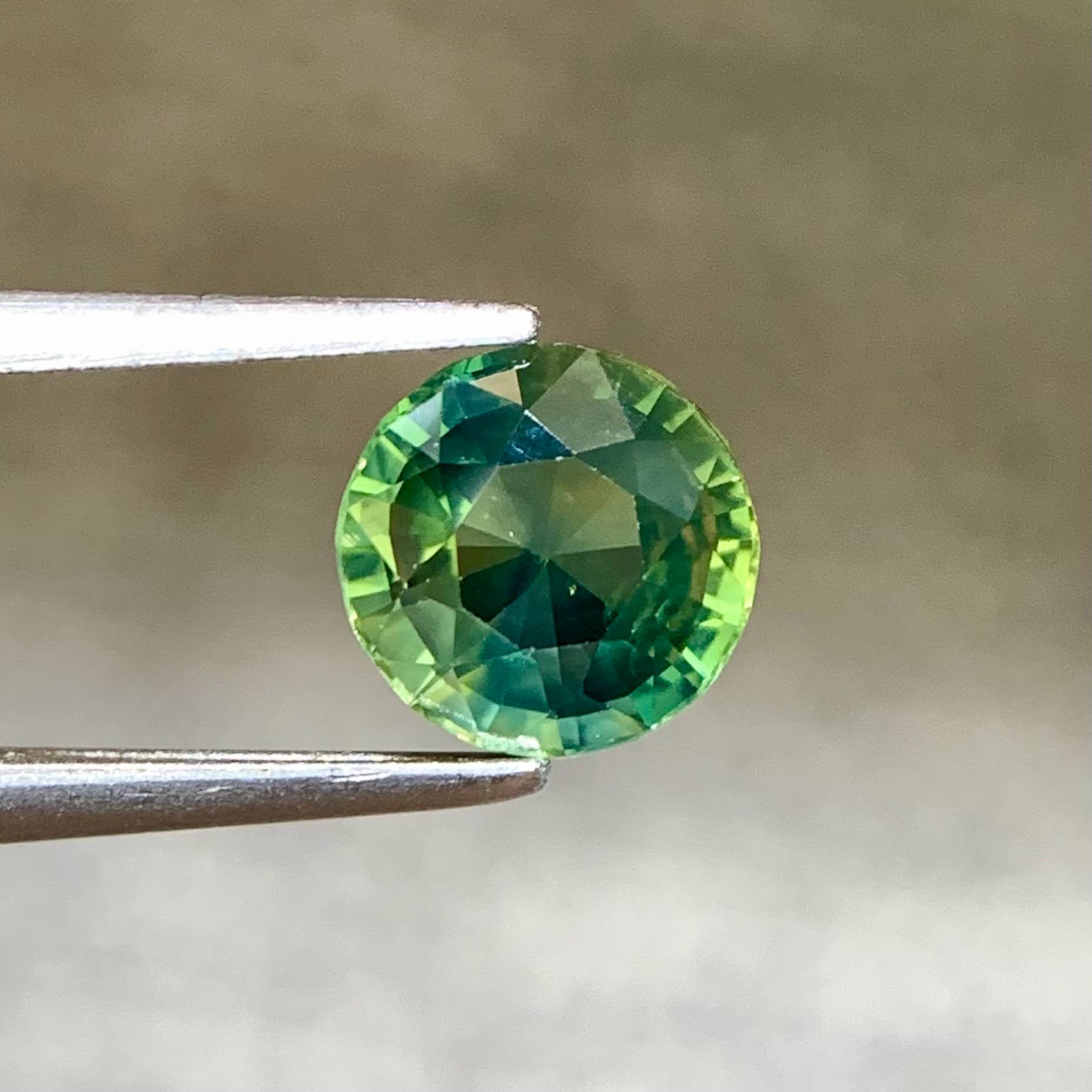 teal-sapphire-1-29ct-madagascar-round