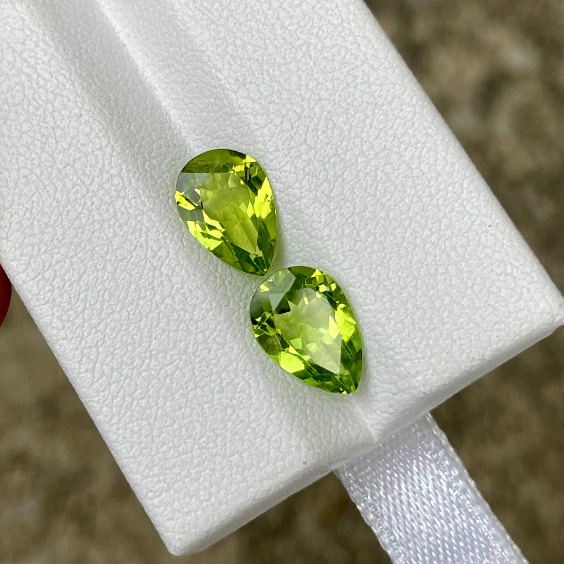 3.85 Carats Green Pear Peridot Pair