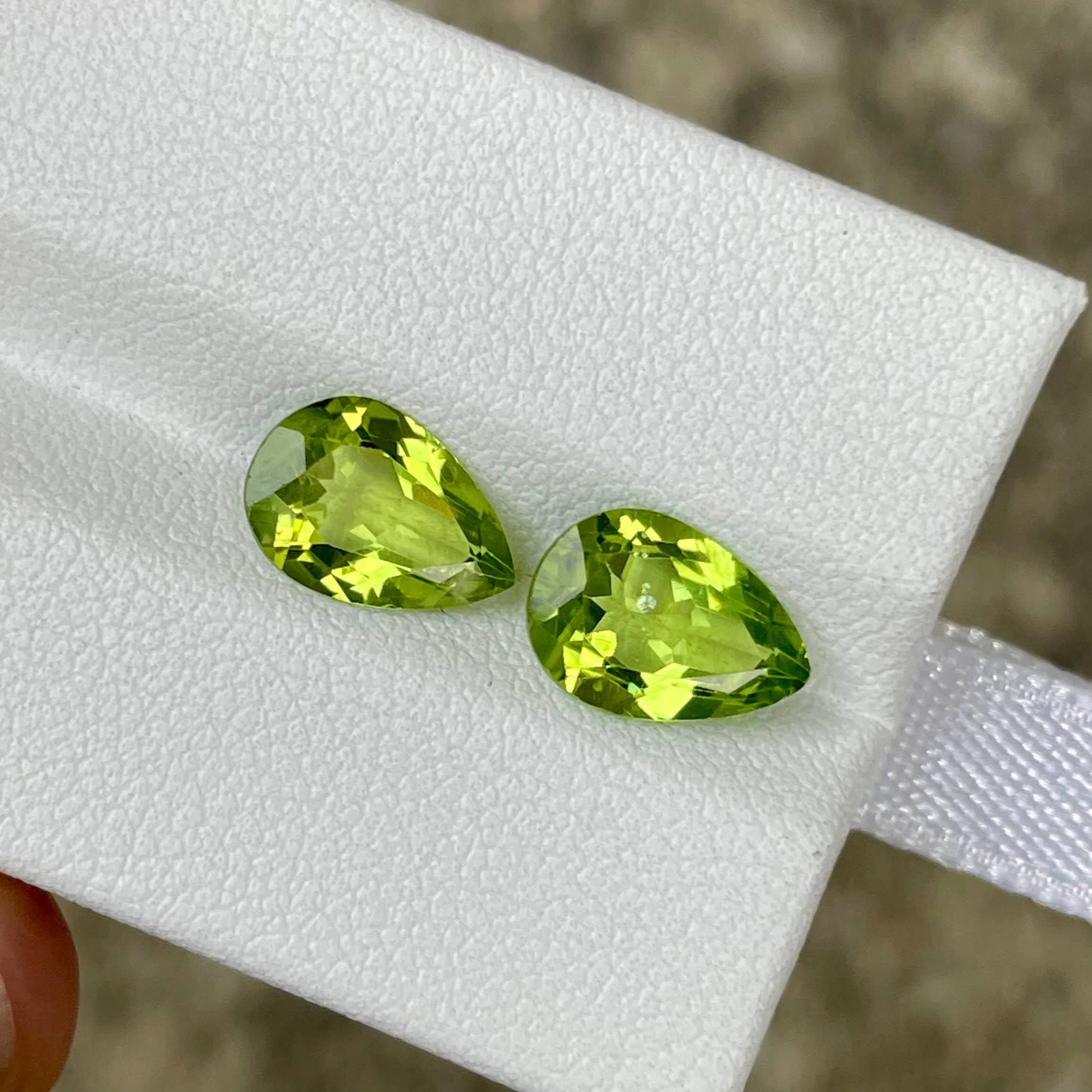 3.85 Carats Green Pear Peridot Pair