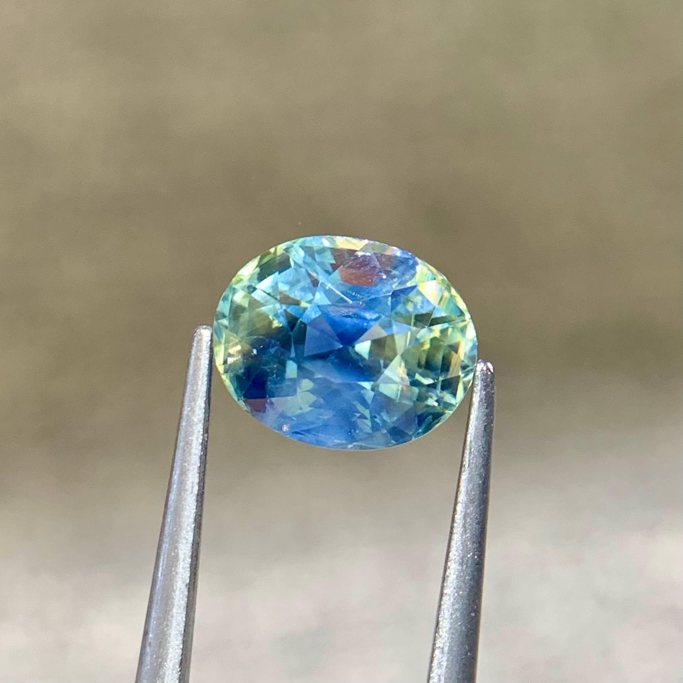 2-65-carats-bicolor-parti-sapphire-oval-faceted-madagascar