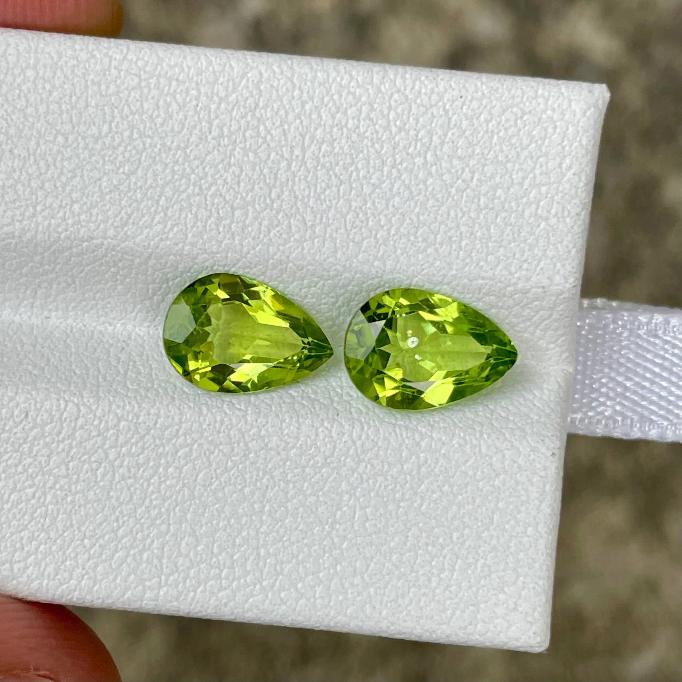 3.85 Carats Green Pear Peridot Pair