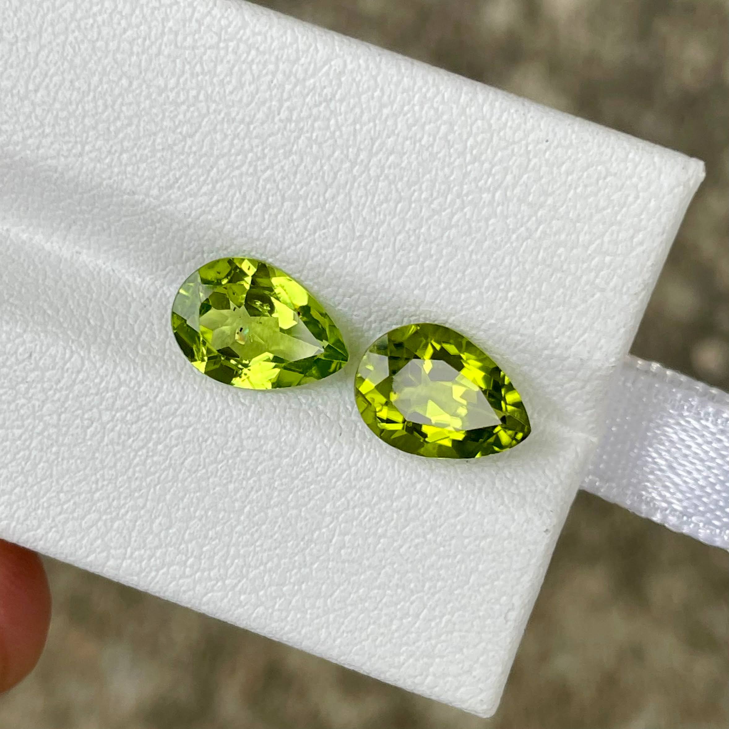 4.28 Carats Green Pear Peridot Pair