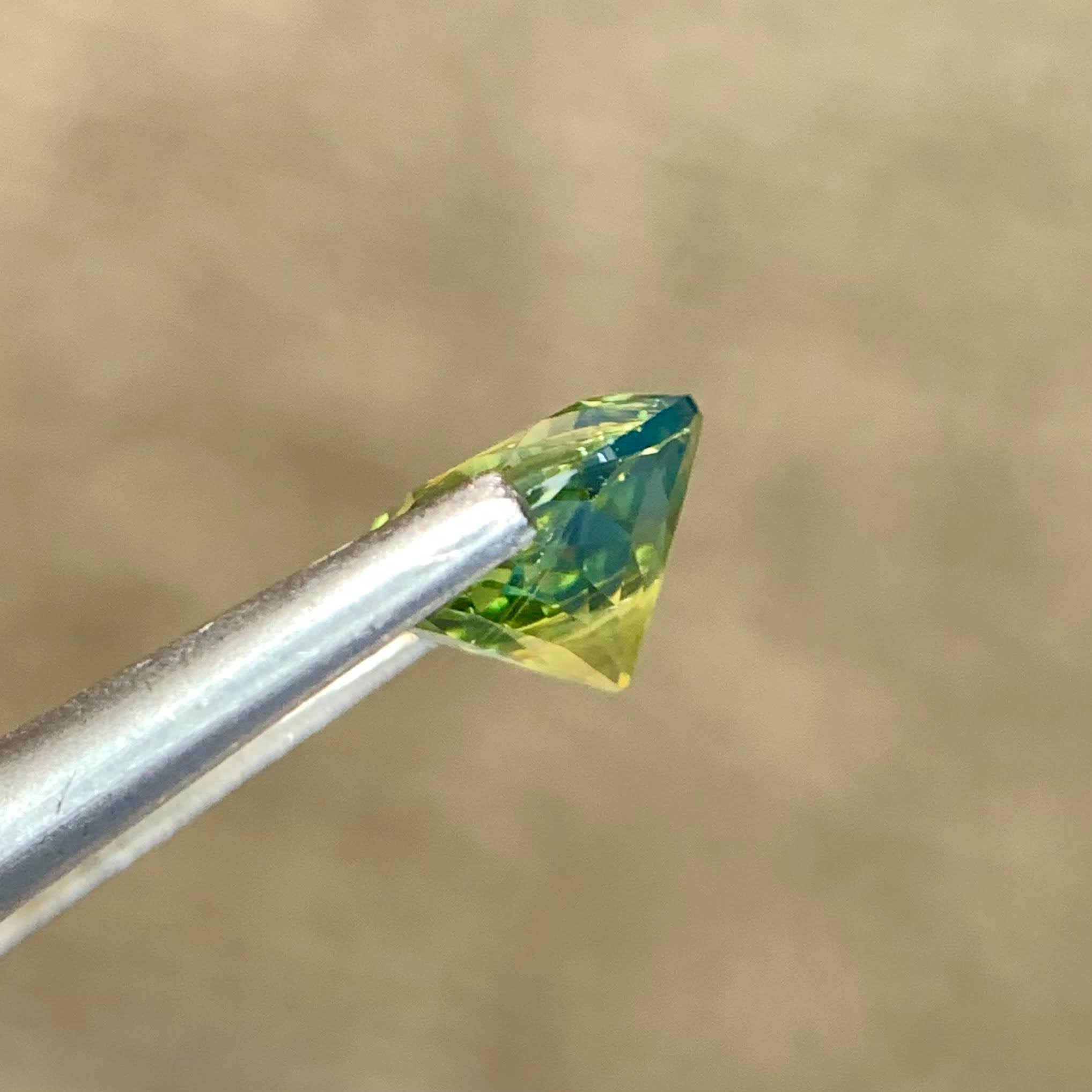 natural-teal-sapphire-1-42ct-madagascar-round-brilliant