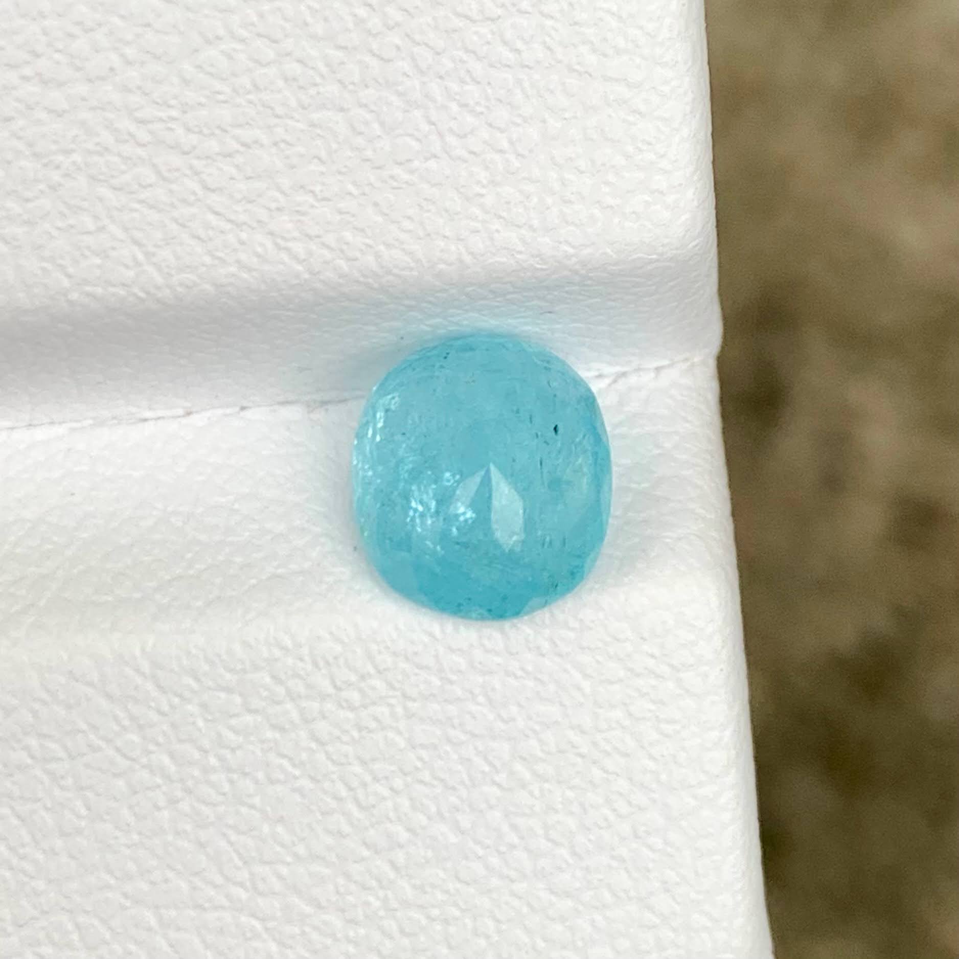 aigs-certified-neon-blue-paraiba-tourmaline-1-81-carats-oval-mozambique