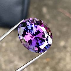 24-75-carats-mermaid-color-tanzanite-oval-faceted-cut-tanzania