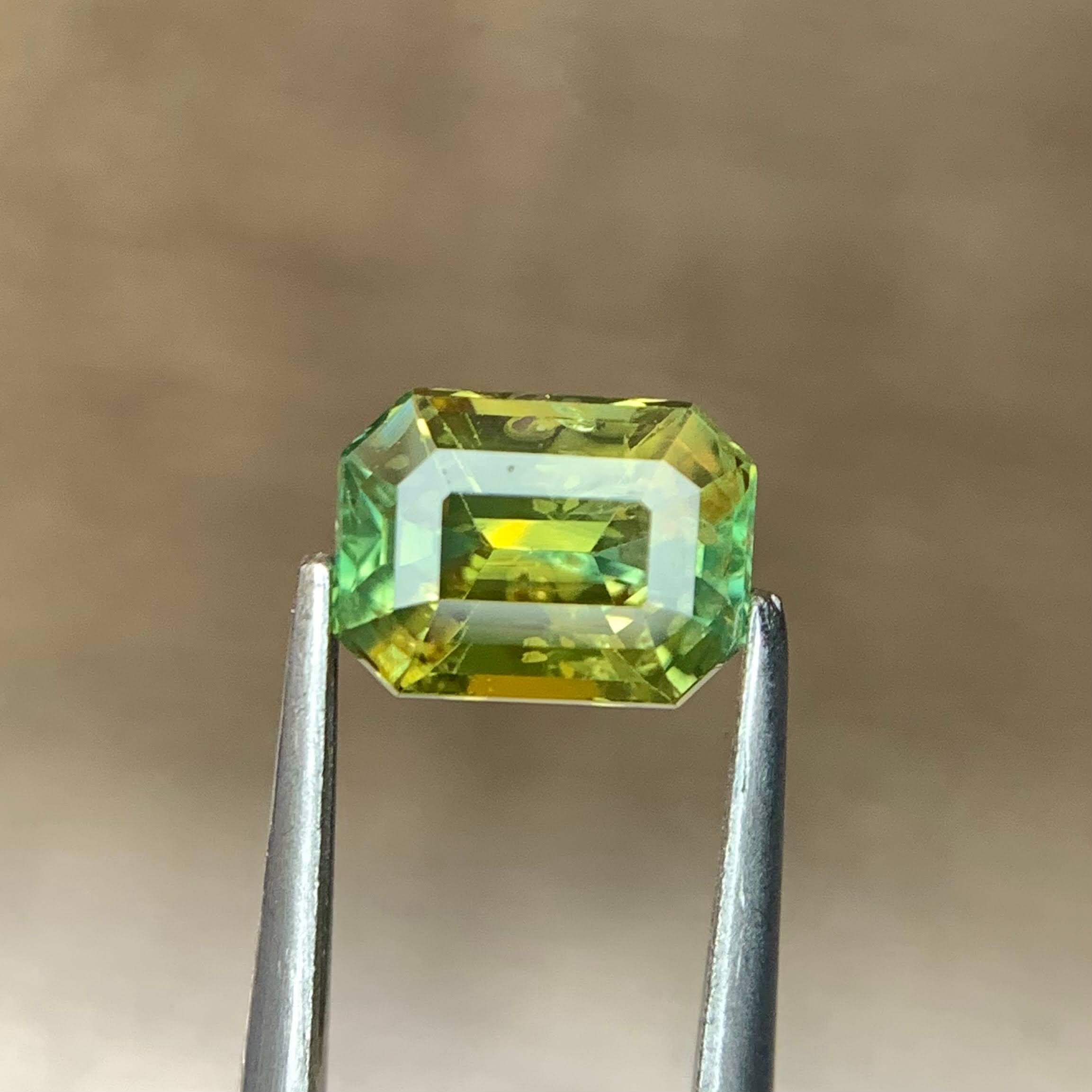 natural-bicolor-sapphire-1-54ct-madagascar-si-octagon-emerald-cut