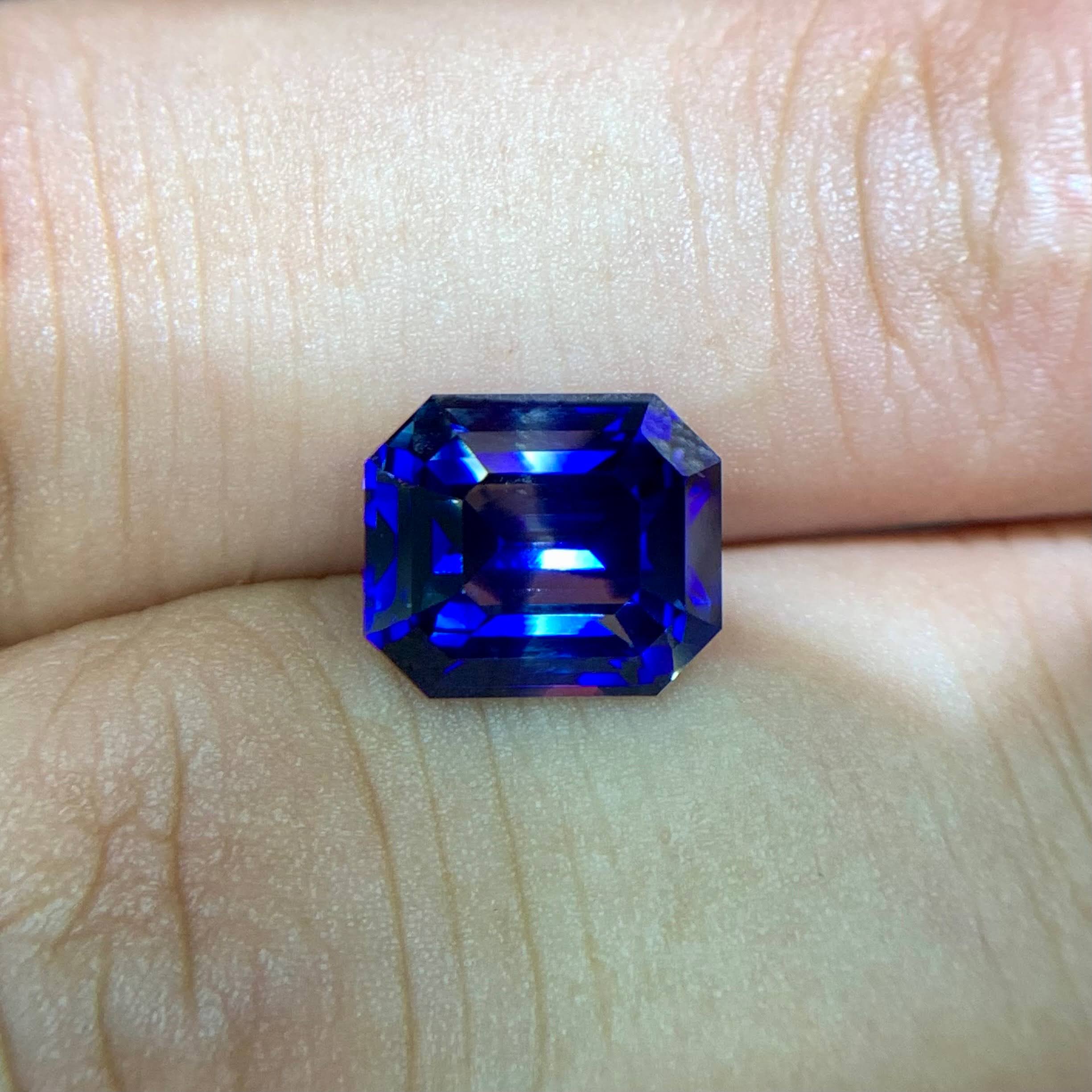 quality-bicolor-sapphire-4-03ct-sri-lanka-si-octagon-emerald-cut