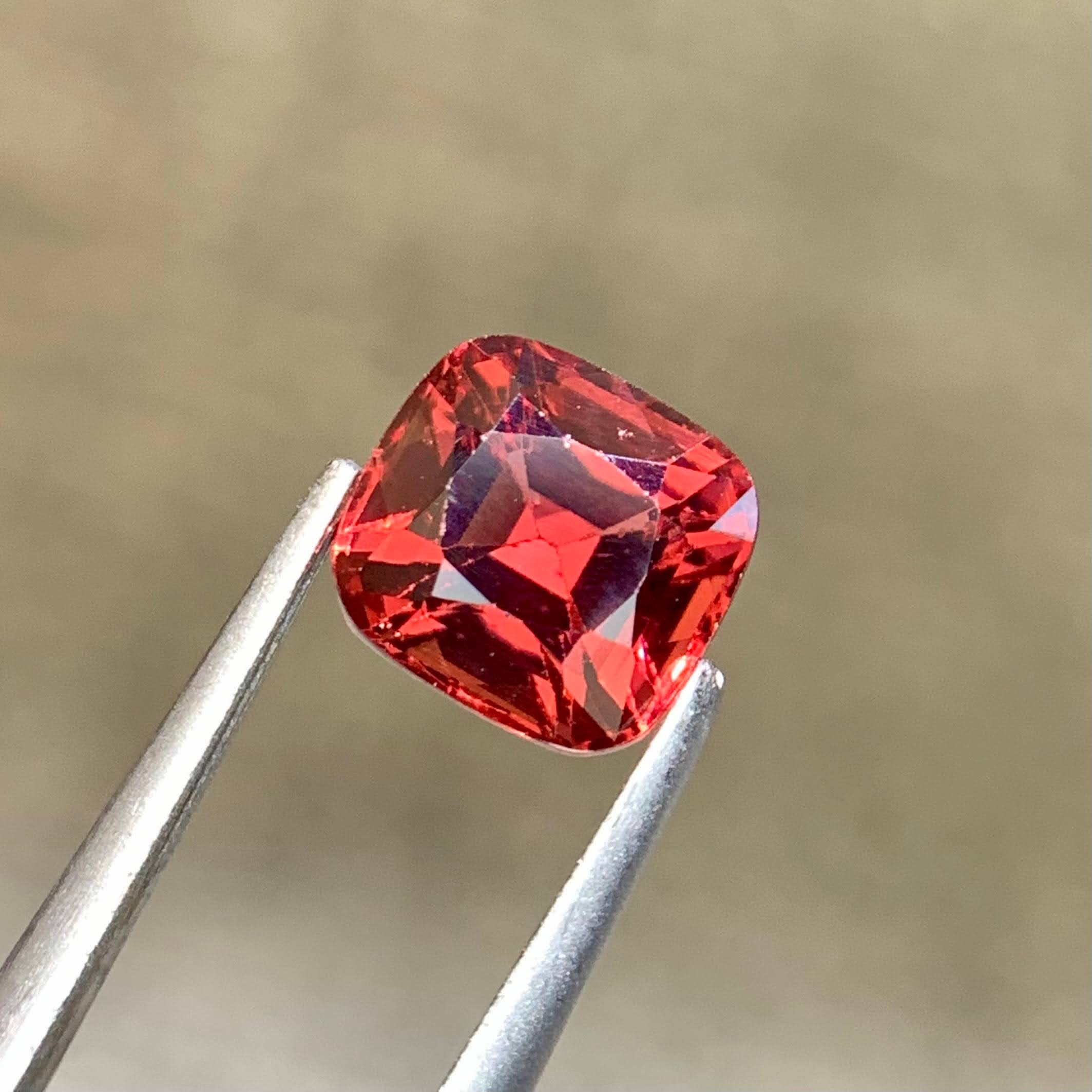 1-91-carats-tanga-mine-orange-red-garnet-cushion-faceted-tanzania