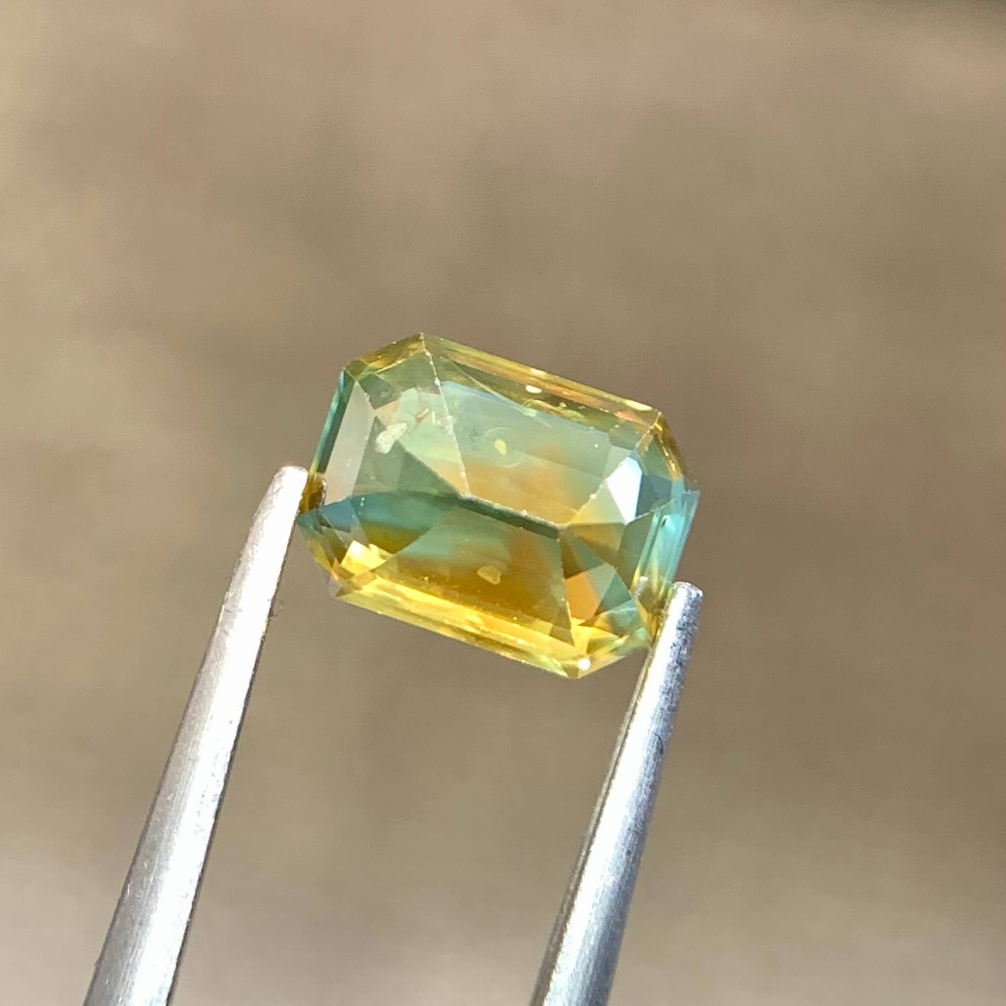 natural-bicolor-sapphire-1-54ct-madagascar-si-octagon-emerald-cut