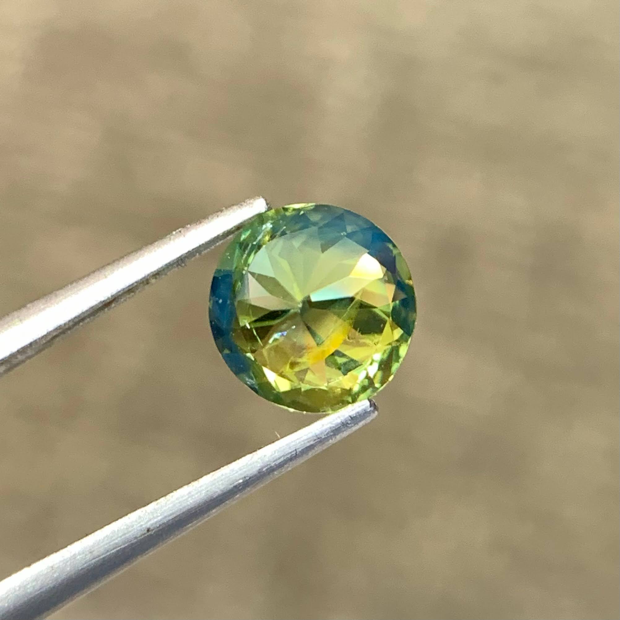 natural-teal-sapphire-1-42ct-madagascar-round-brilliant