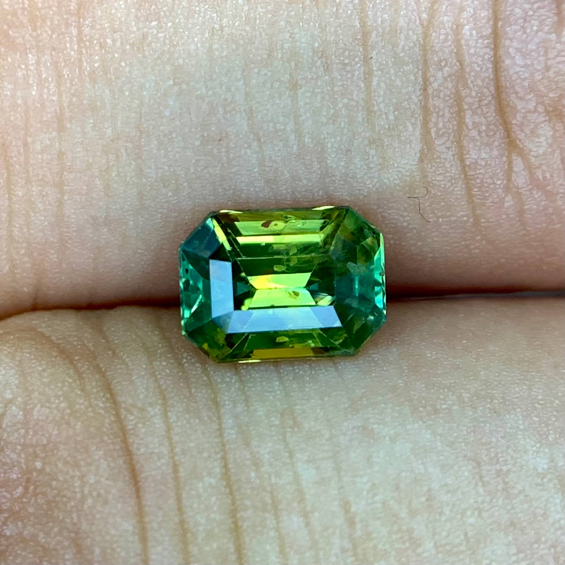 natural-bicolor-sapphire-1-54ct-madagascar-si-octagon-emerald-cut