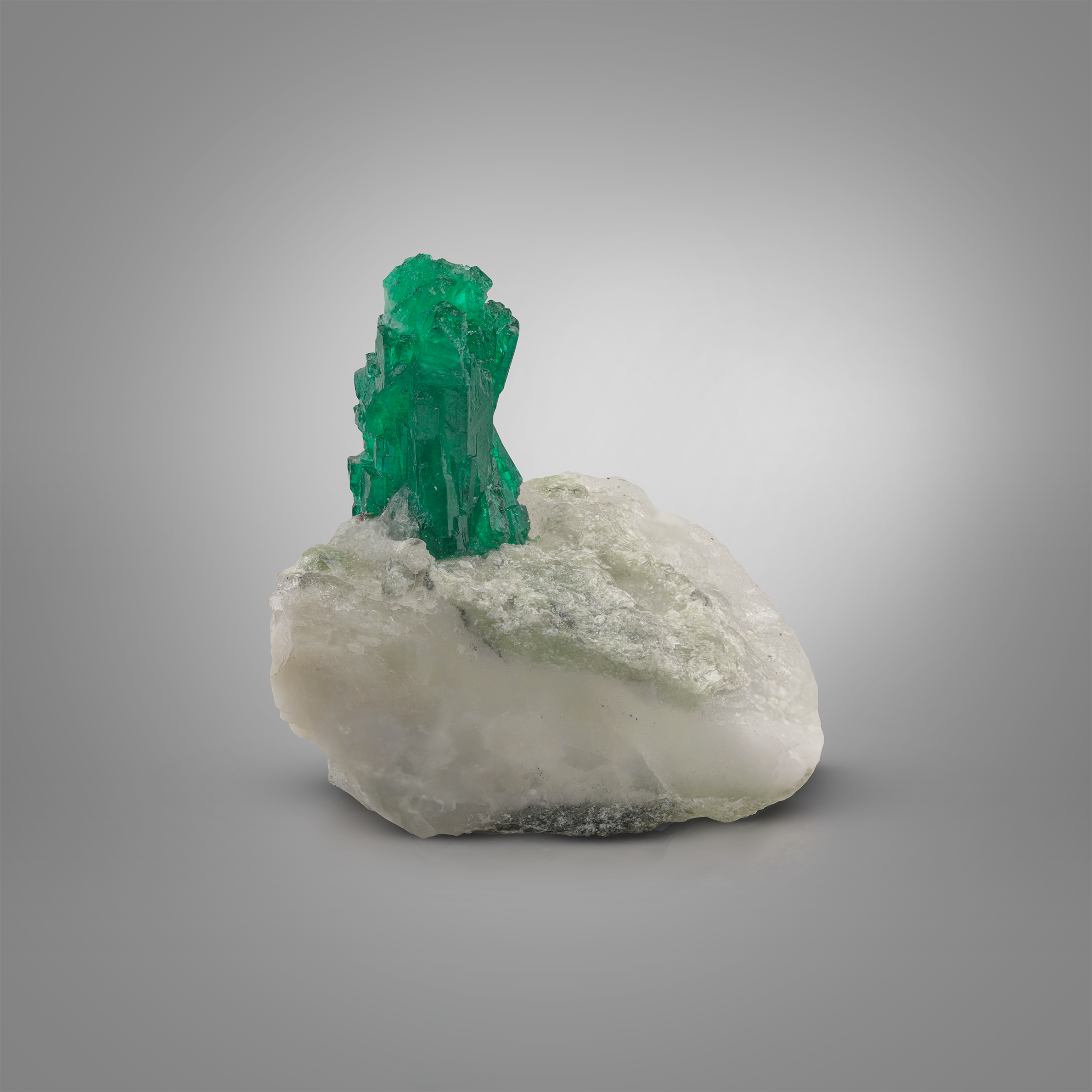 Standing Emerald Crystal On Matrix