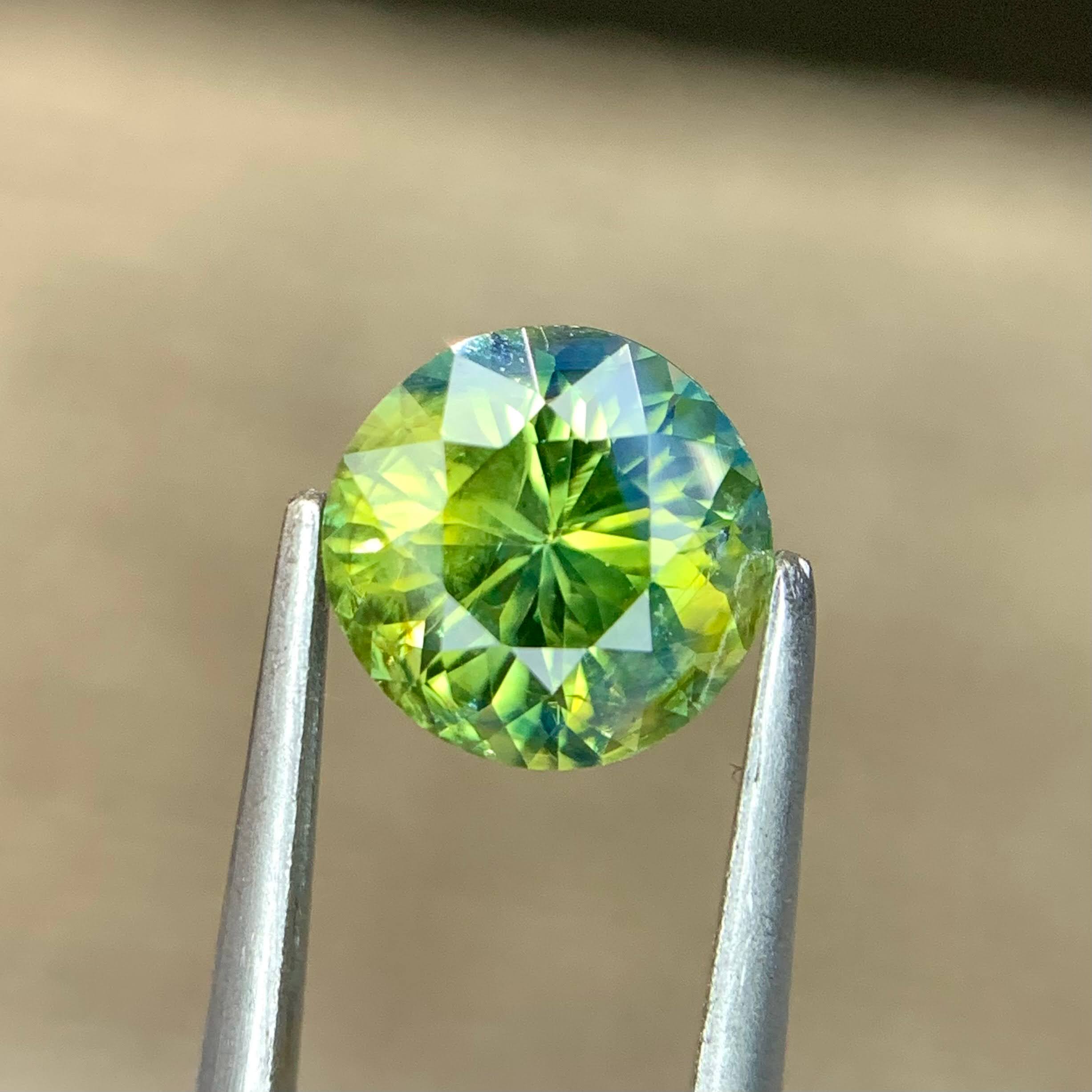 natural-teal-sapphire-1-42ct-madagascar-round-brilliant