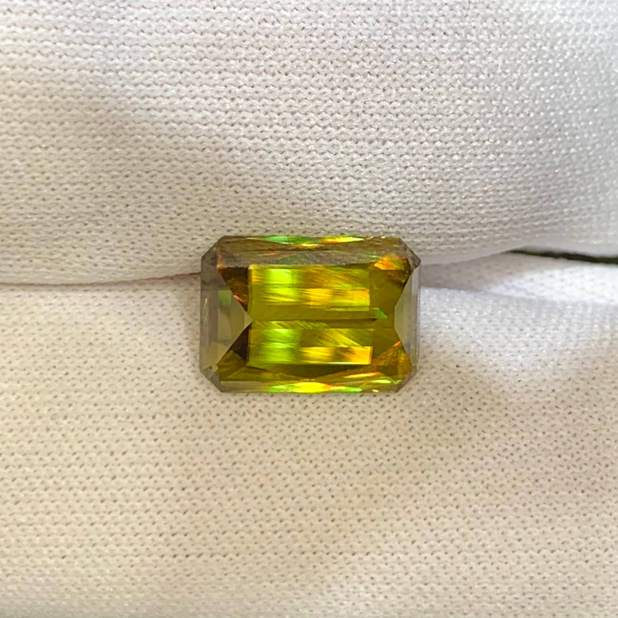4-67-carats-fire-rainbow-sphene-octagon-radiant-cut-madagascar
