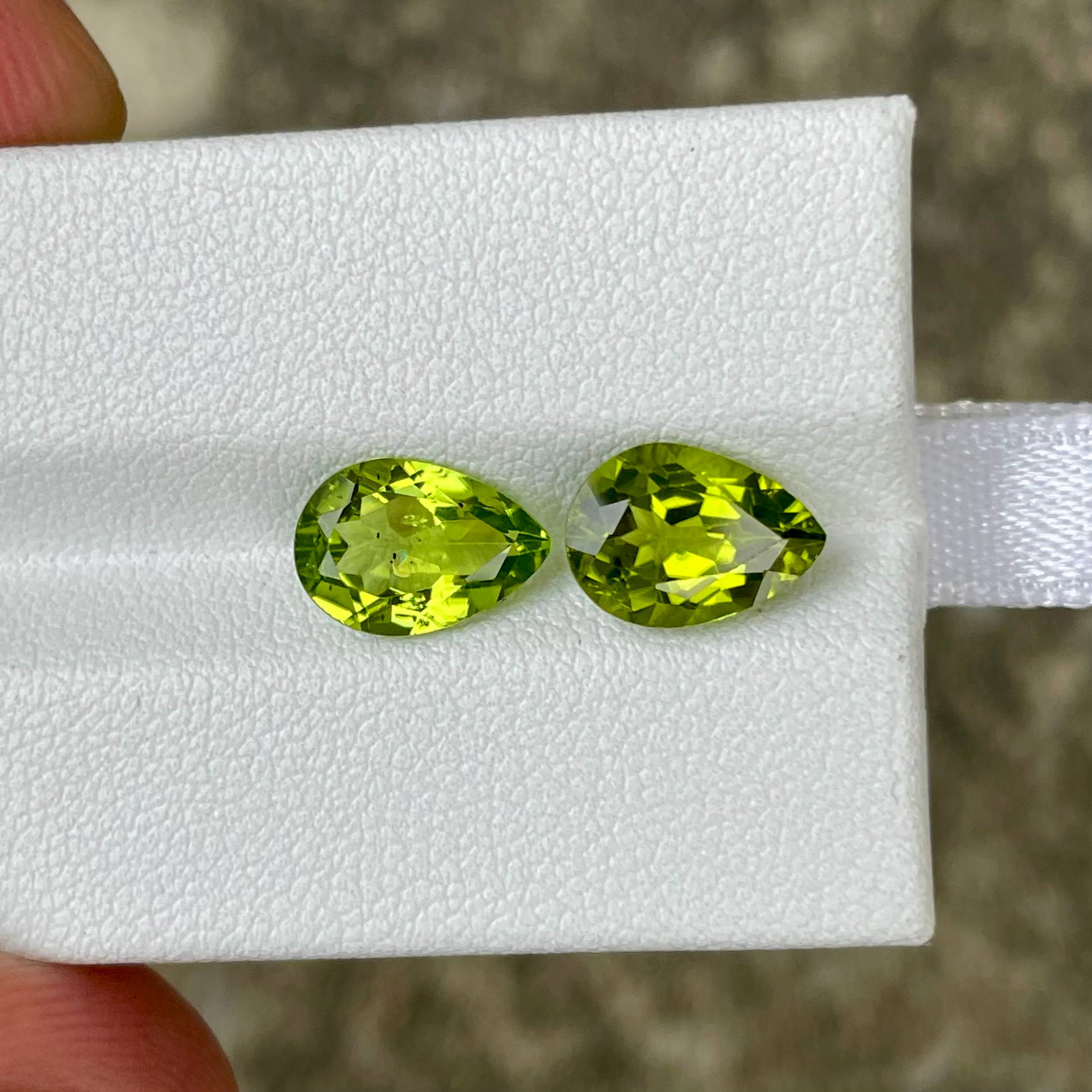 4.28 Carats Green Pear Peridot Pair