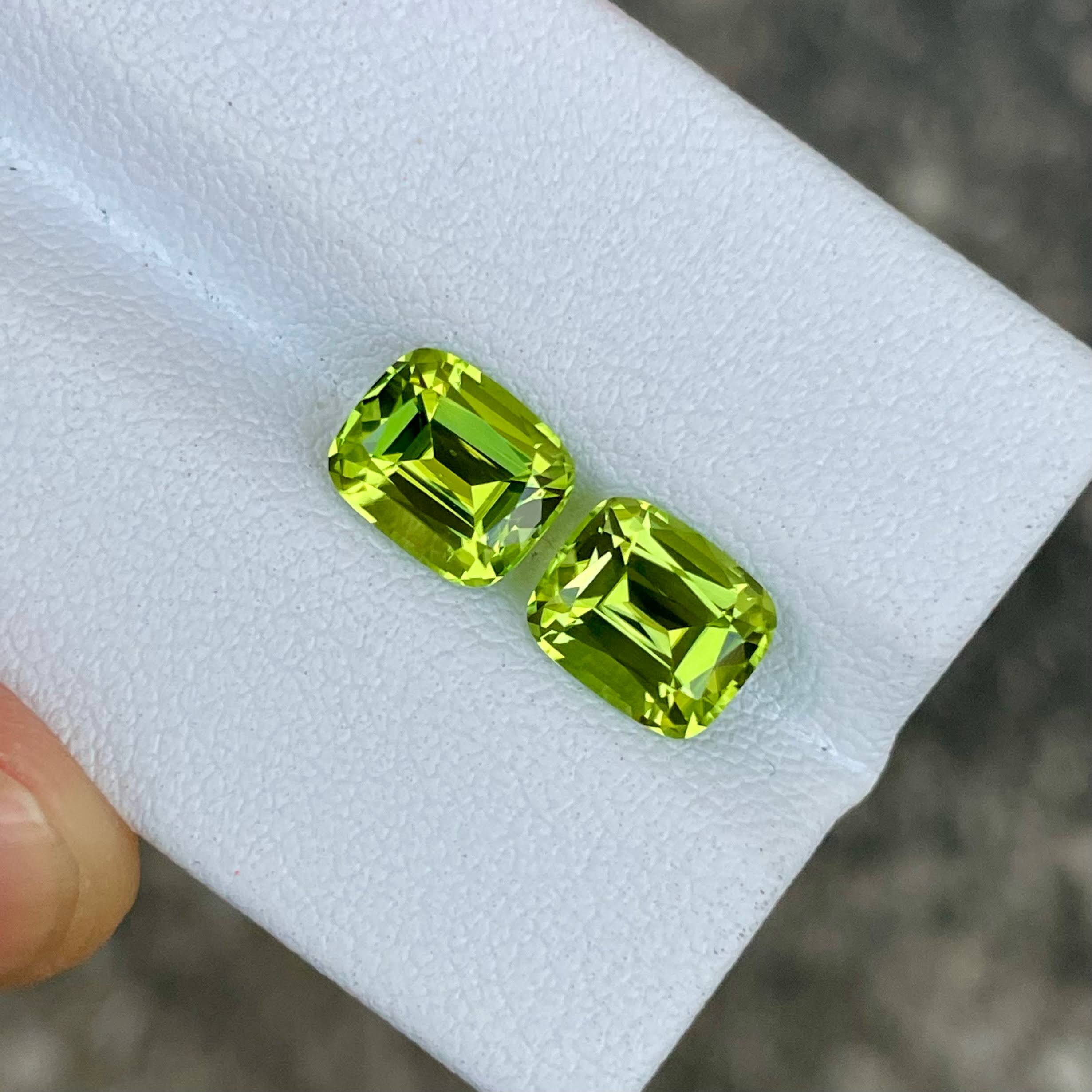 3.85 Carats Green Peridot Cushion Pair